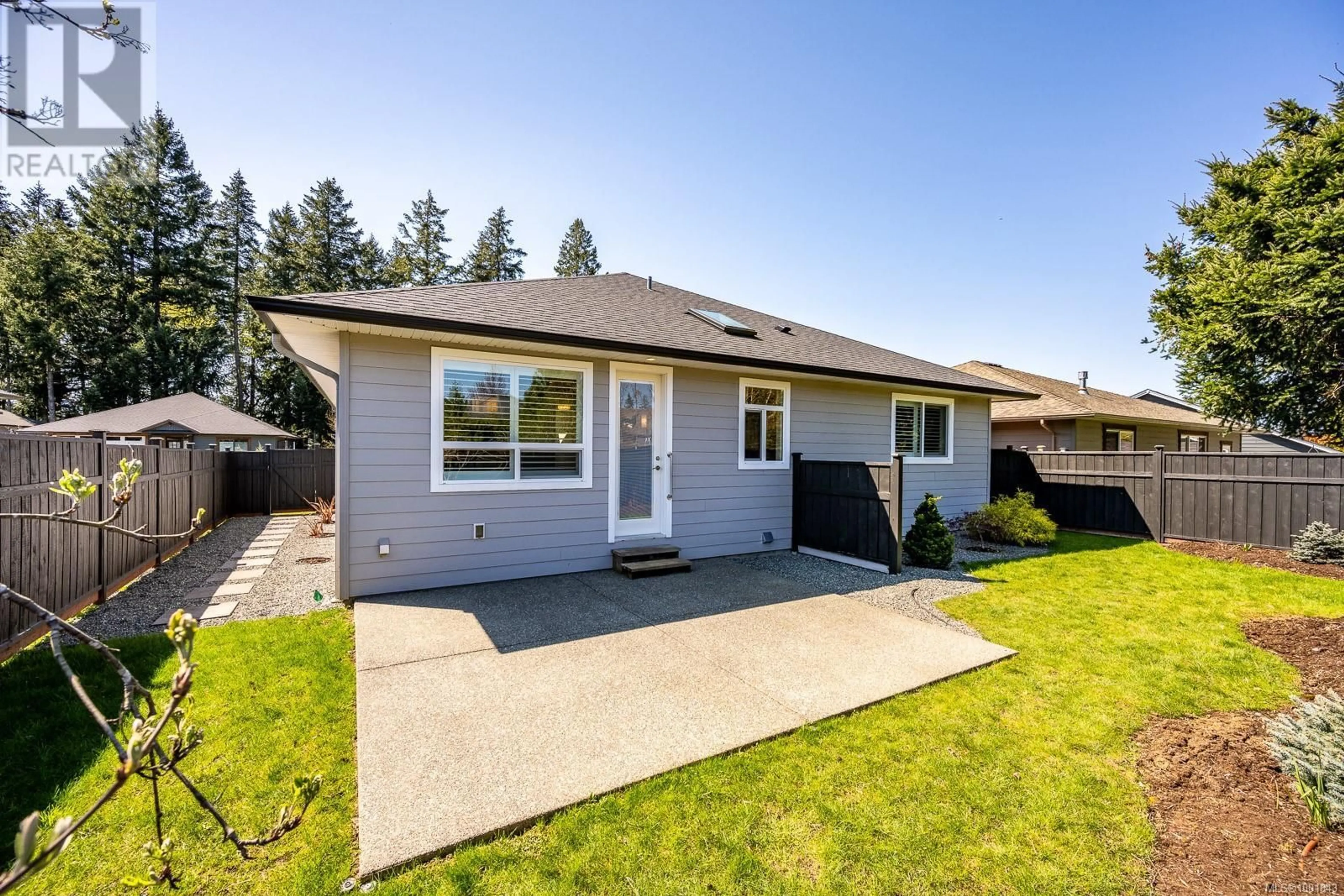 Home with vinyl exterior material, street for 2462 DAKOTA PLACE, Comox British Columbia V9M0B9