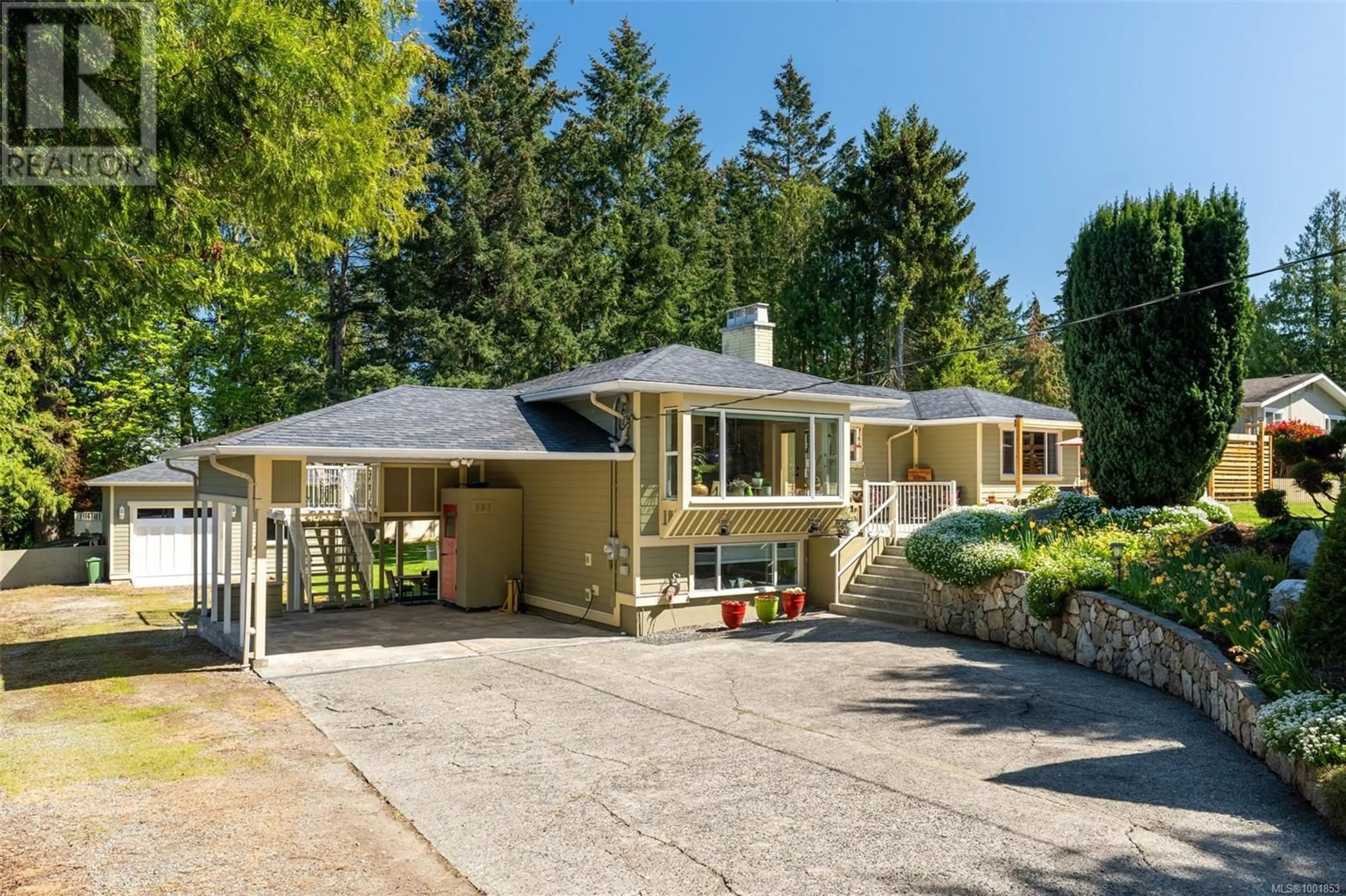 A pic from outside/outdoor area/front of a property/back of a property/a pic from drone, street for 8545 ALDOUS TERRACE, North Saanich British Columbia V8L1K9