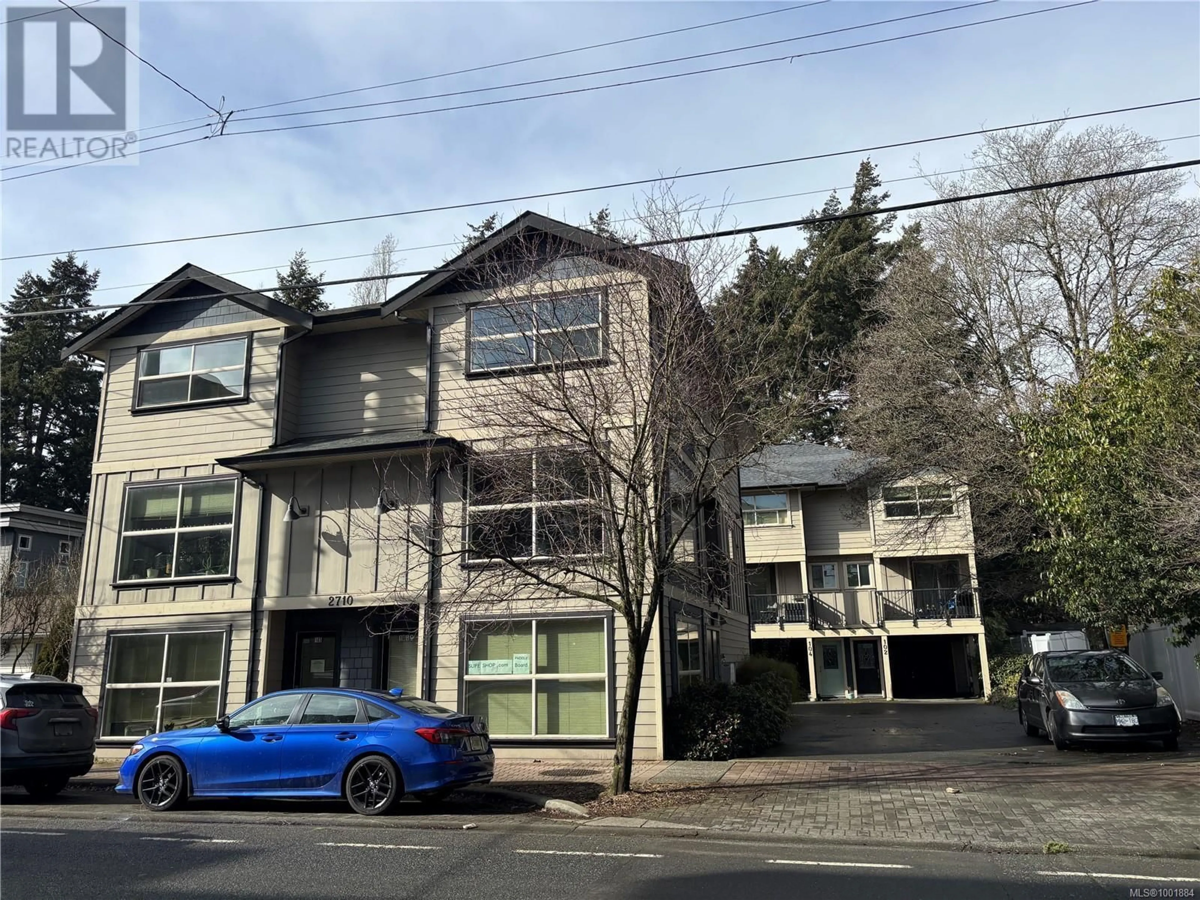 A pic from outside/outdoor area/front of a property/back of a property/a pic from drone, street for 101 - 2710 PEATT ROAD, Langford British Columbia V9B3V3