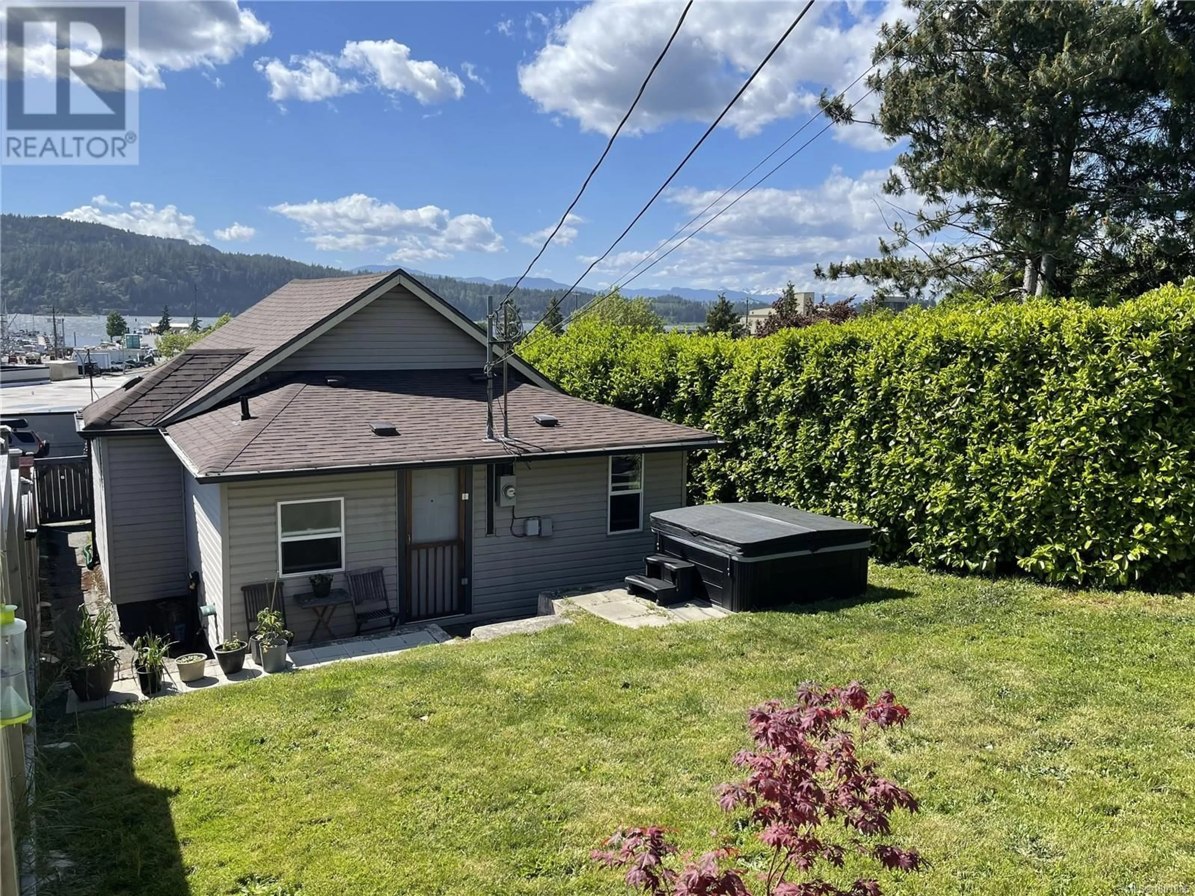 A pic from outside/outdoor area/front of a property/back of a property/a pic from drone, mountain view for 3265 2ND AVENUE, Port Alberni British Columbia V9Y4C5