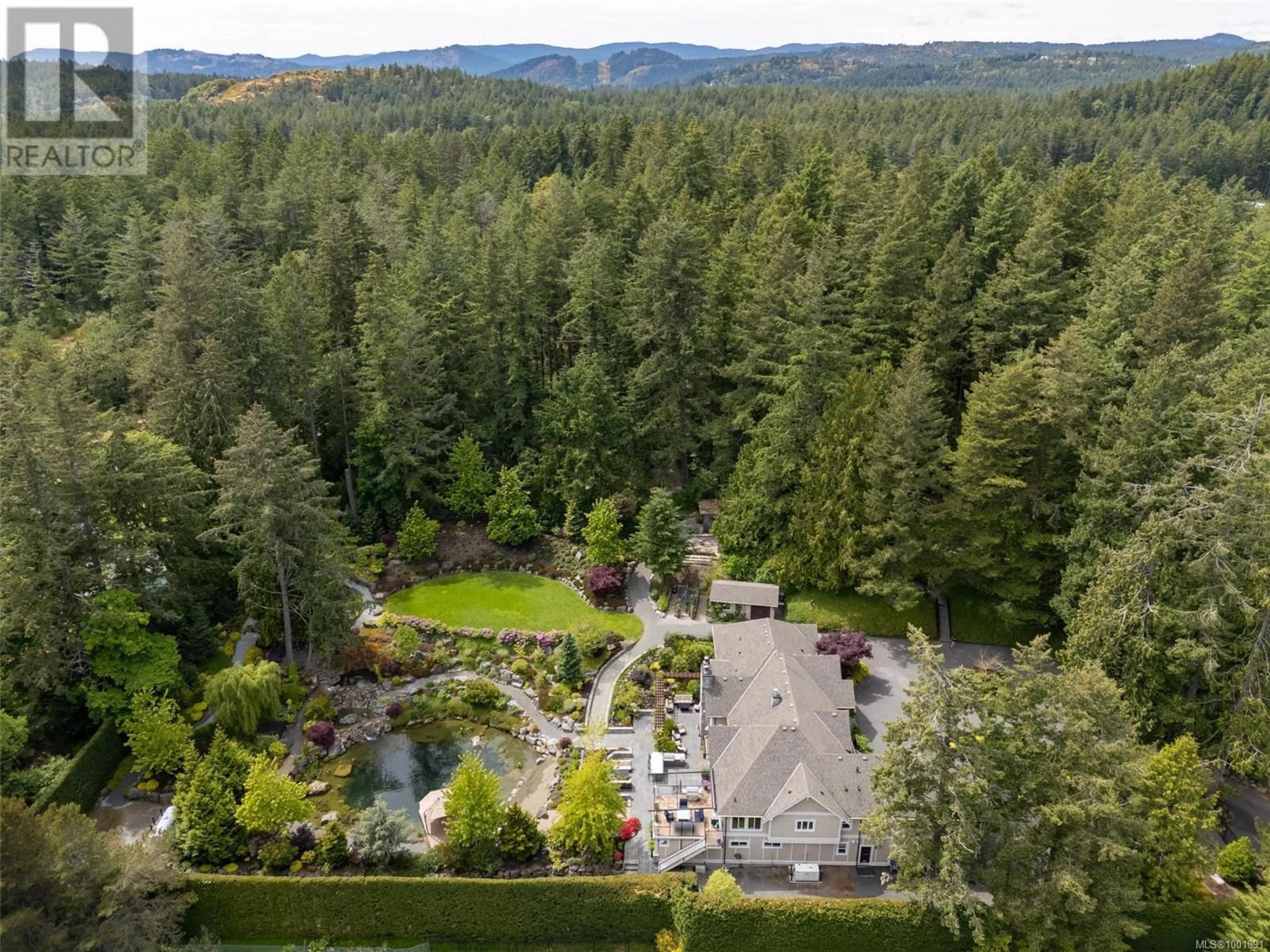 A pic from outside/outdoor area/front of a property/back of a property/a pic from drone, forest/trees view for 441 GLENDOWER ROAD, Saanich British Columbia V9E2B9