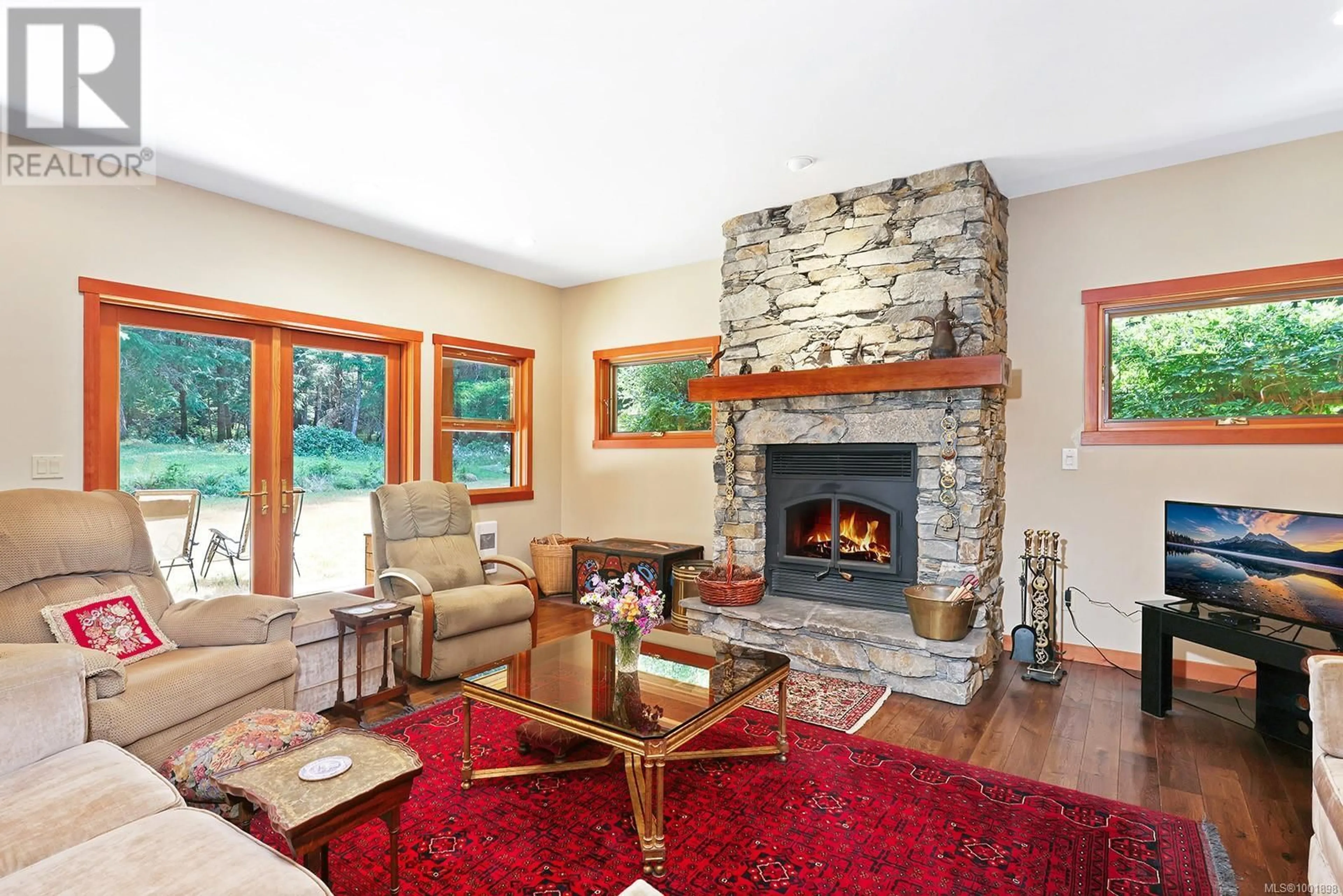 Living room with furniture, unknown for 1645 LEA SMITH ROAD, Hornby Island British Columbia V0R1Z0