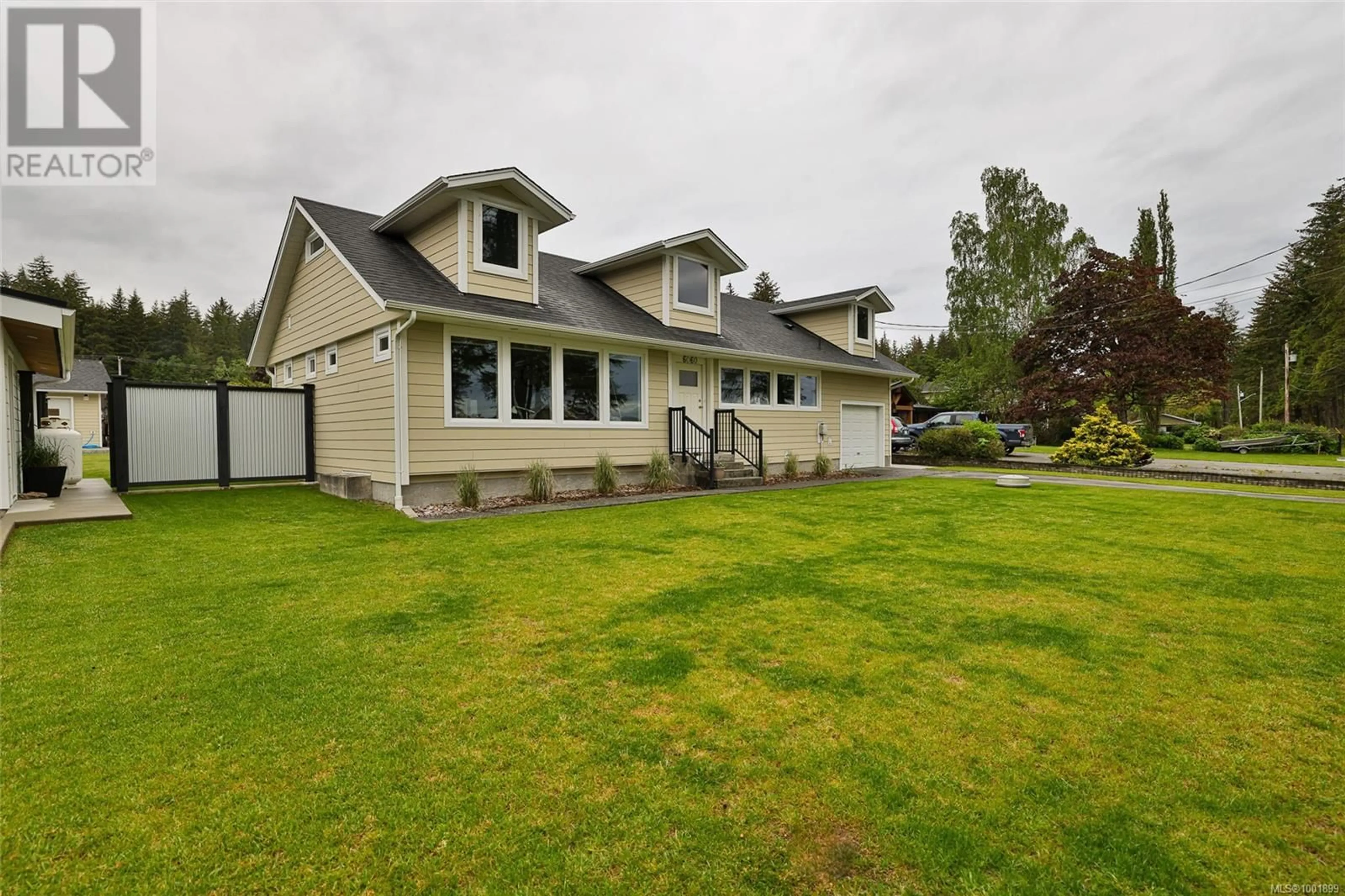 A pic from outside/outdoor area/front of a property/back of a property/a pic from drone, street for 6060 STOREY'S BEACH ROAD, Port Hardy British Columbia V0N2P0