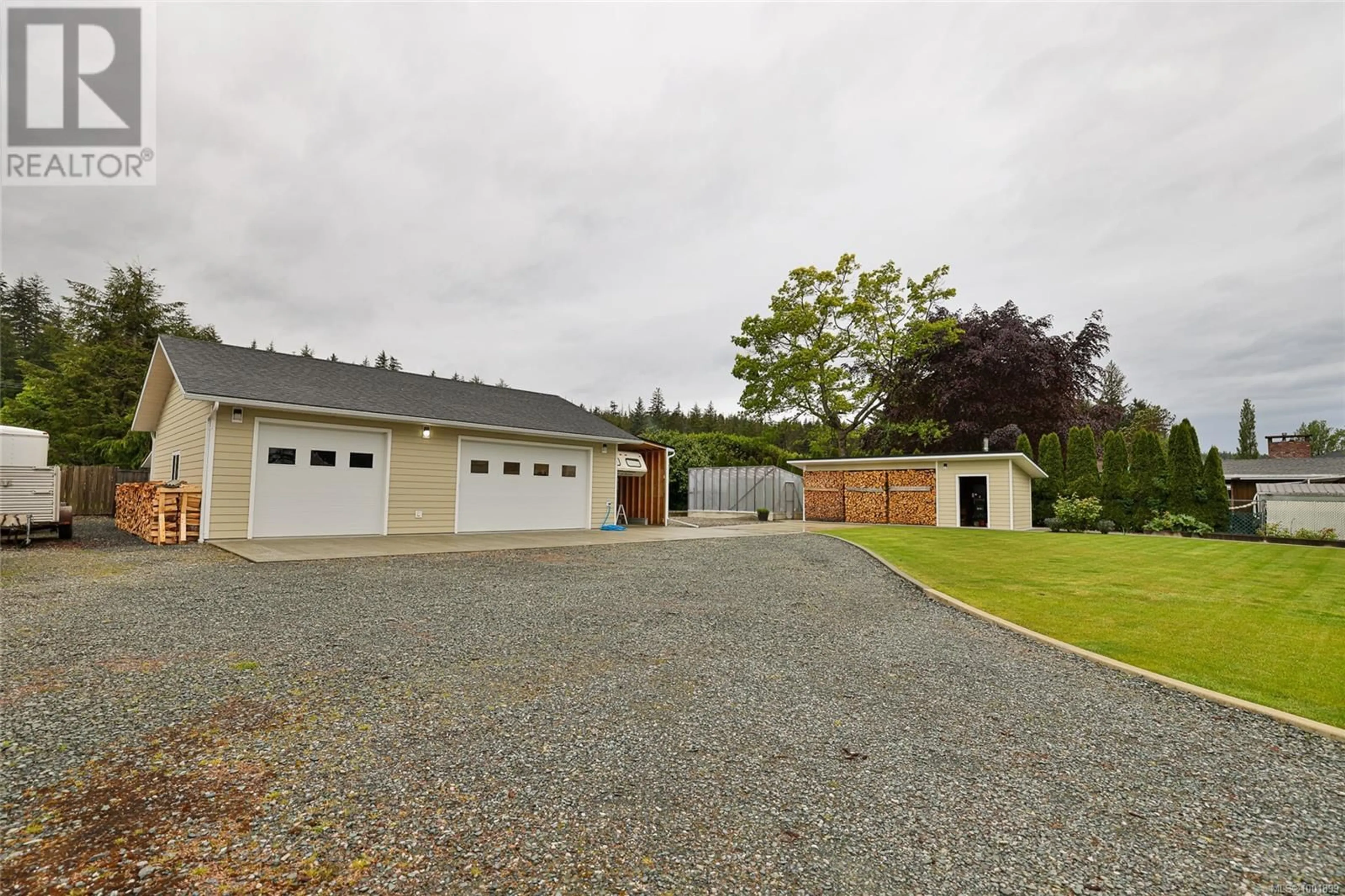 A pic from outside/outdoor area/front of a property/back of a property/a pic from drone, street for 6060 STOREY'S BEACH ROAD, Port Hardy British Columbia V0N2P0