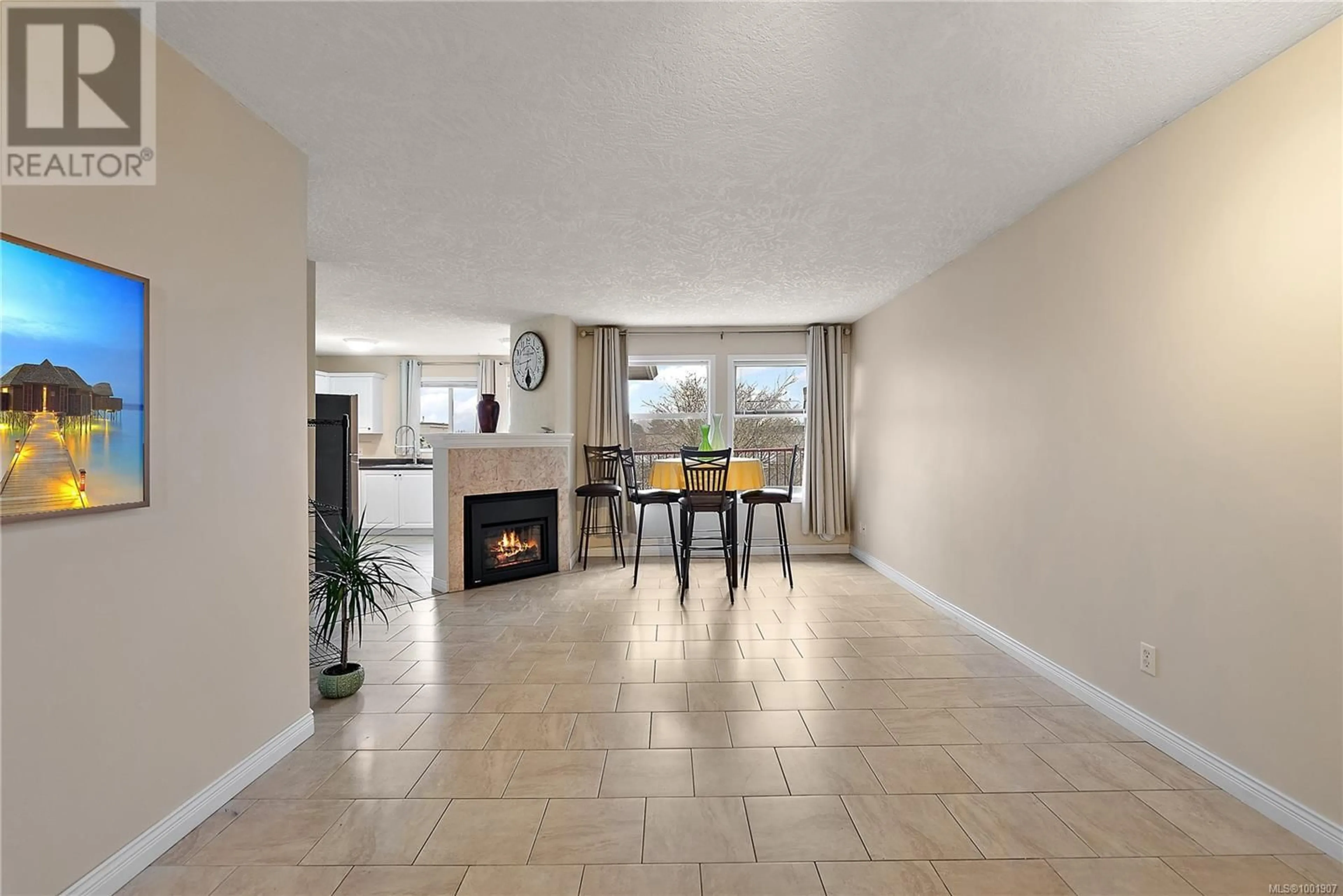 Living room with furniture, ceramic/tile floor for 306 - 7865 PATTERSON ROAD, Central Saanich British Columbia V8M2C7