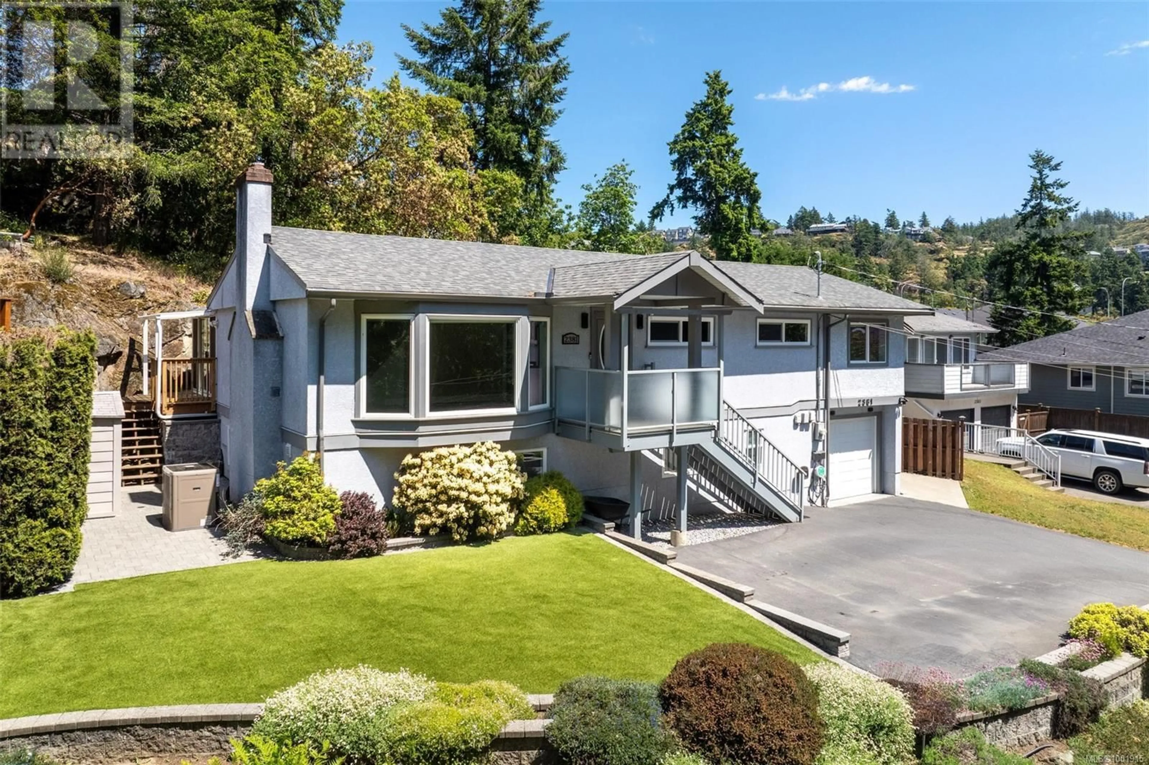 Home with vinyl exterior material, street for 2381 BELLAMY ROAD, Langford British Columbia V9B3M8