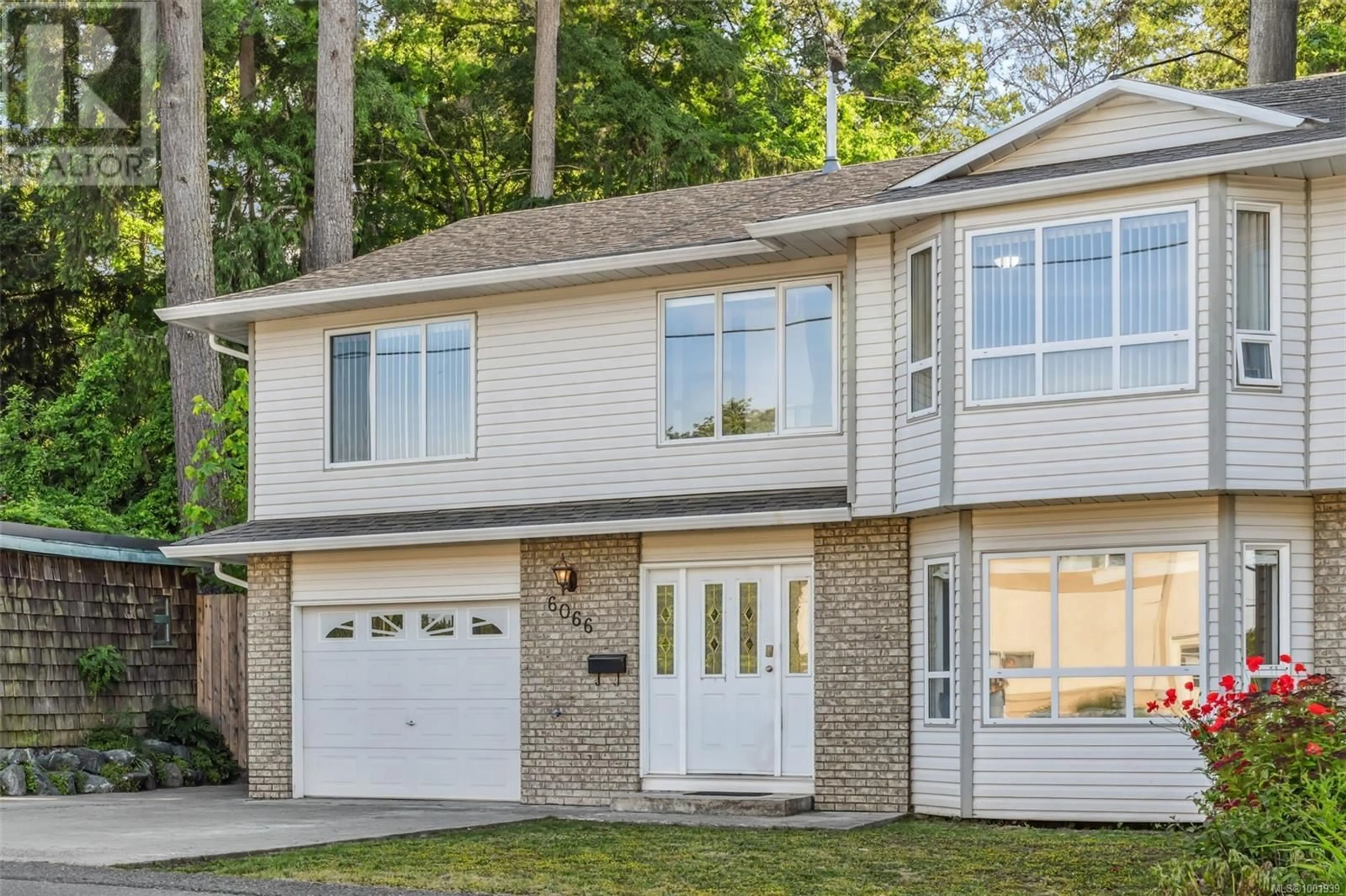 Home with brick exterior material, street for 6066 TRUESDALE STREET, Duncan British Columbia V9L2J2