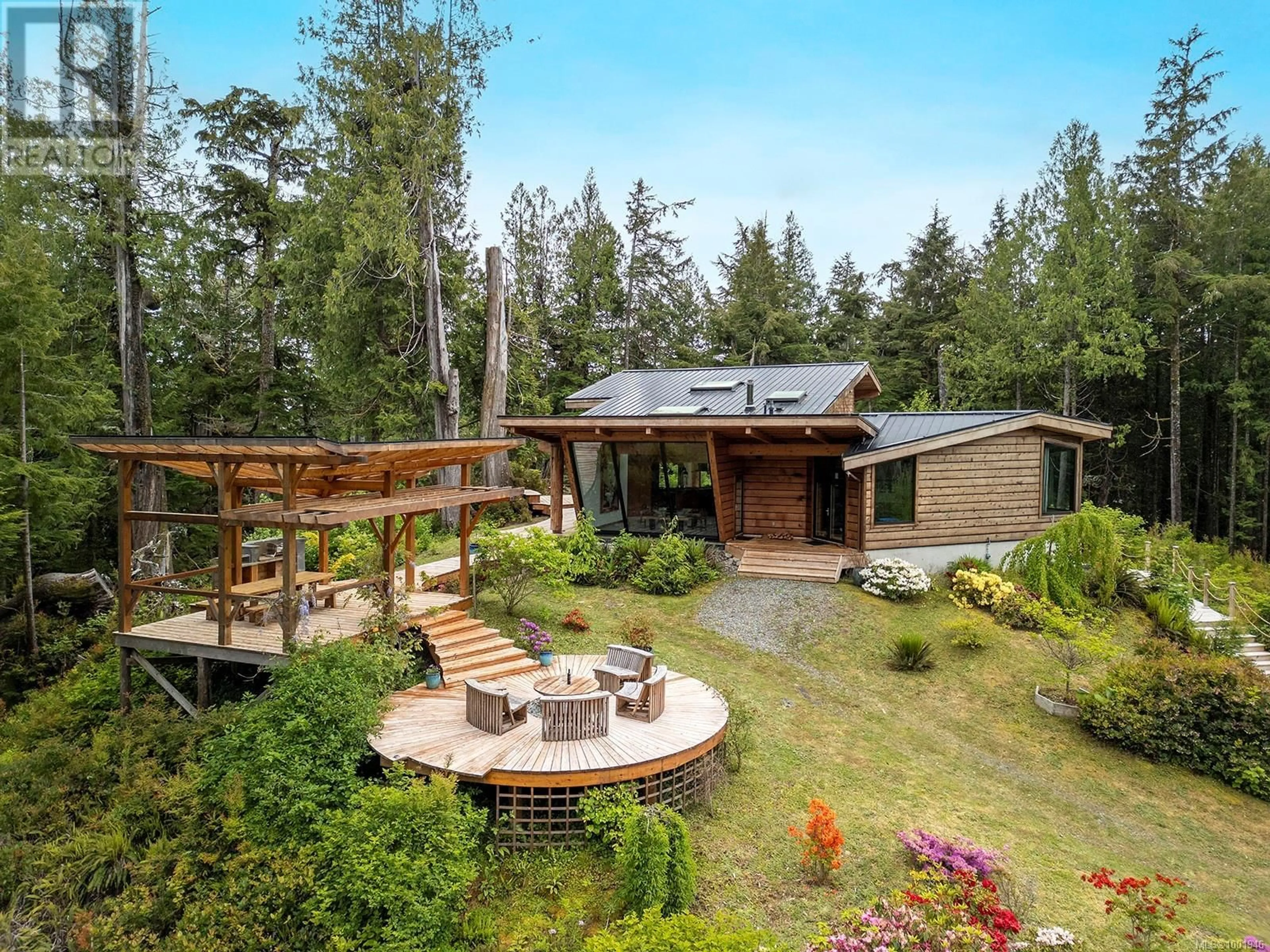 A pic from outside/outdoor area/front of a property/back of a property/a pic from drone, forest/trees view for 0 NEILSON ISLAND, Tofino British Columbia V0R2Z0
