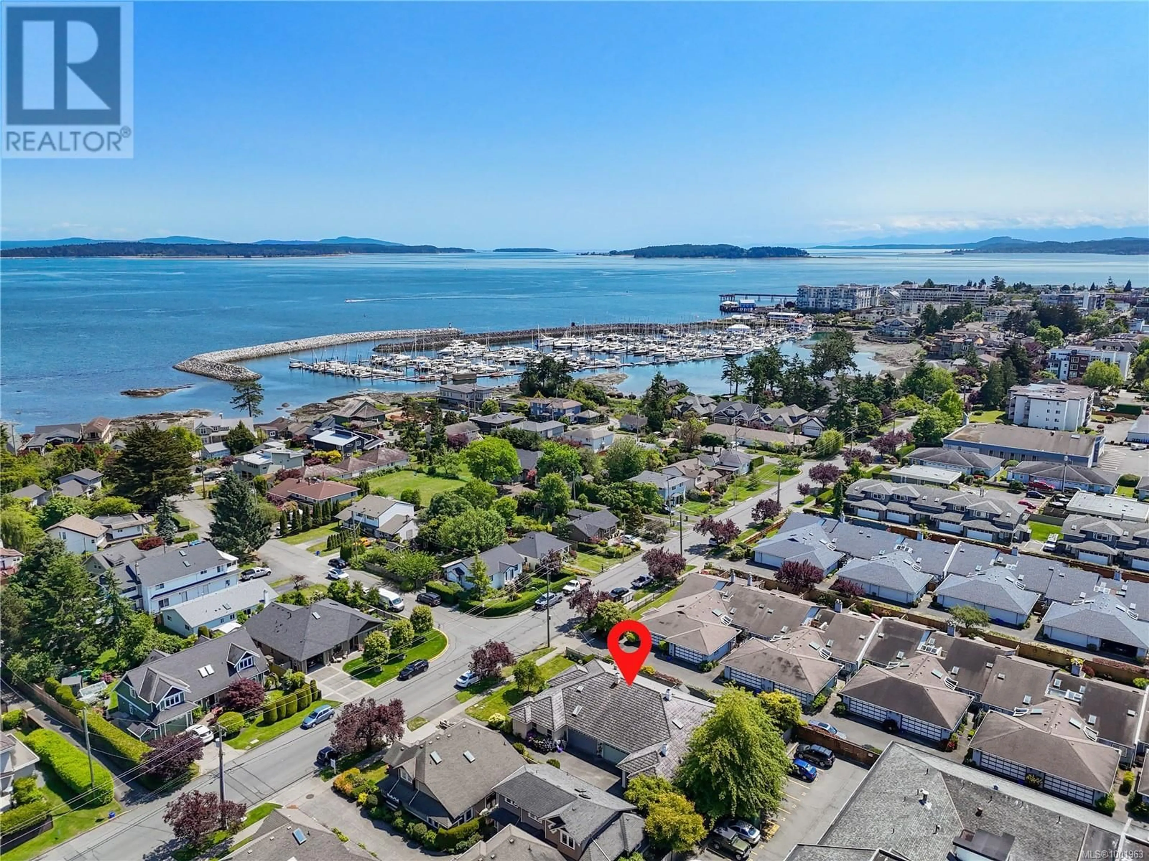 A pic from outside/outdoor area/front of a property/back of a property/a pic from drone, water/lake/river/ocean view for 10126 THIRD STREET, Sidney British Columbia V8L3B3