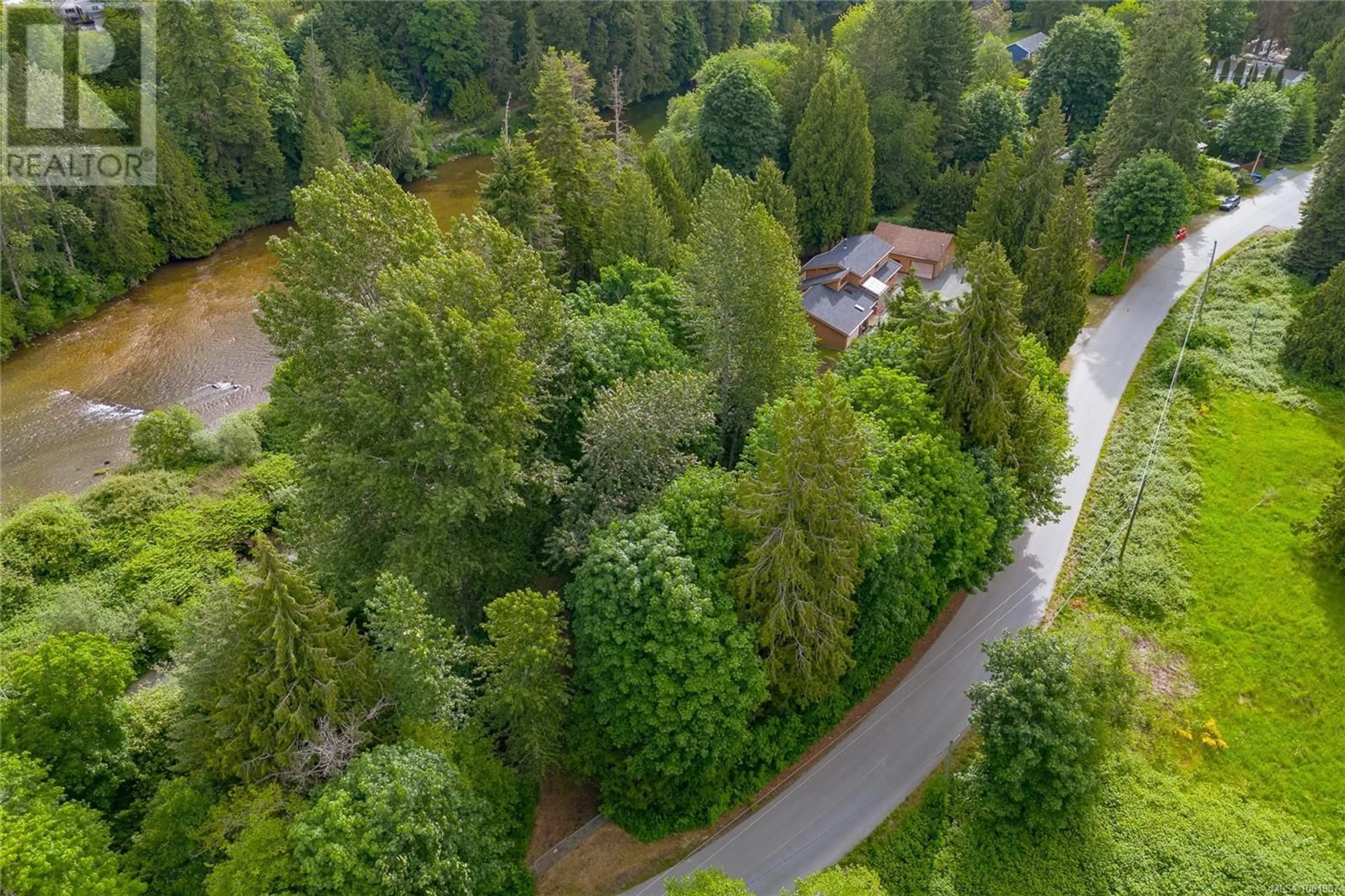 A pic from outside/outdoor area/front of a property/back of a property/a pic from drone, forest/trees view for 1670 WILKINSON ROAD, Nanaimo British Columbia V9X1V6