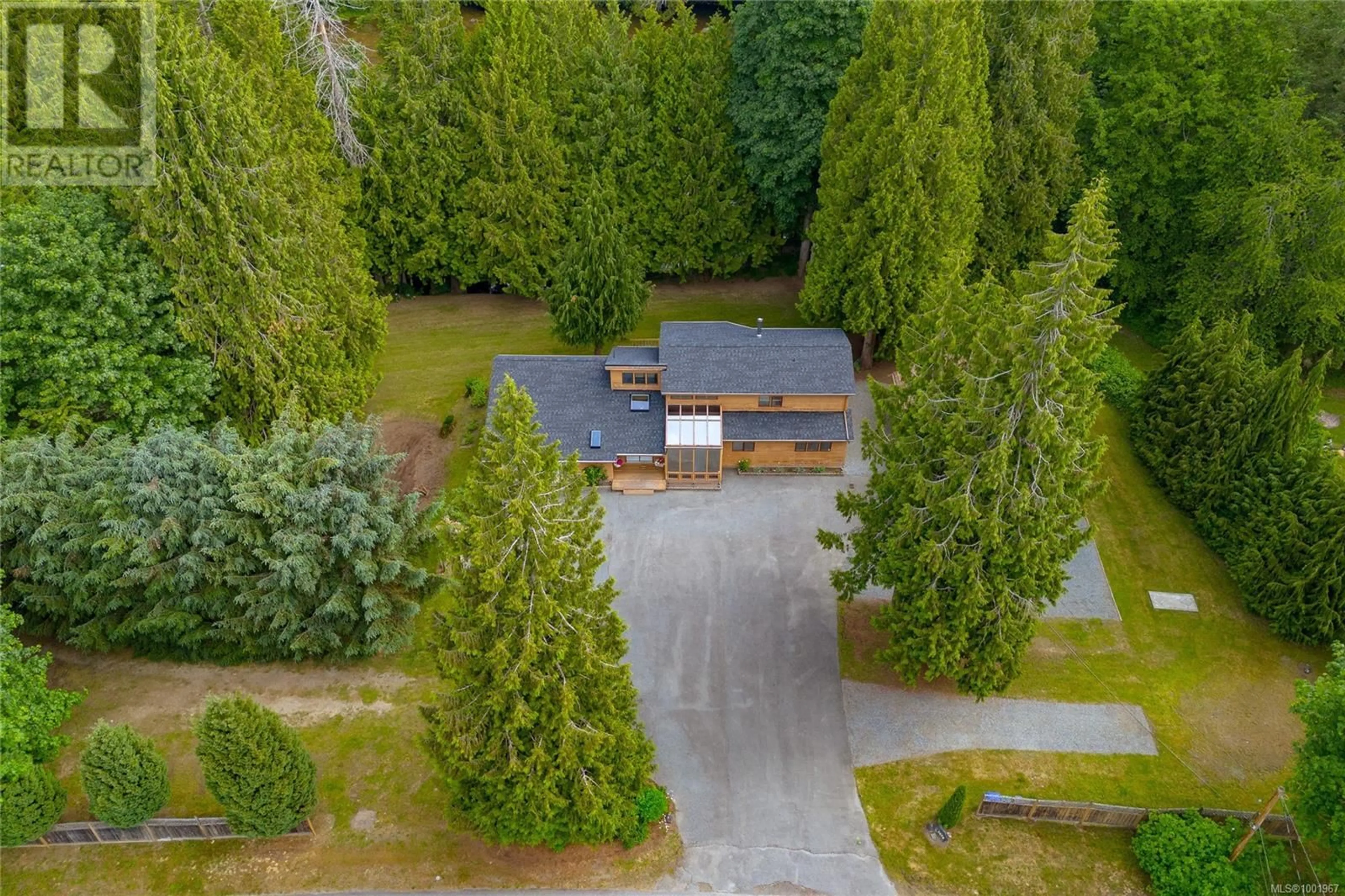 A pic from outside/outdoor area/front of a property/back of a property/a pic from drone, forest/trees view for 1670 WILKINSON ROAD, Nanaimo British Columbia V9X1V6