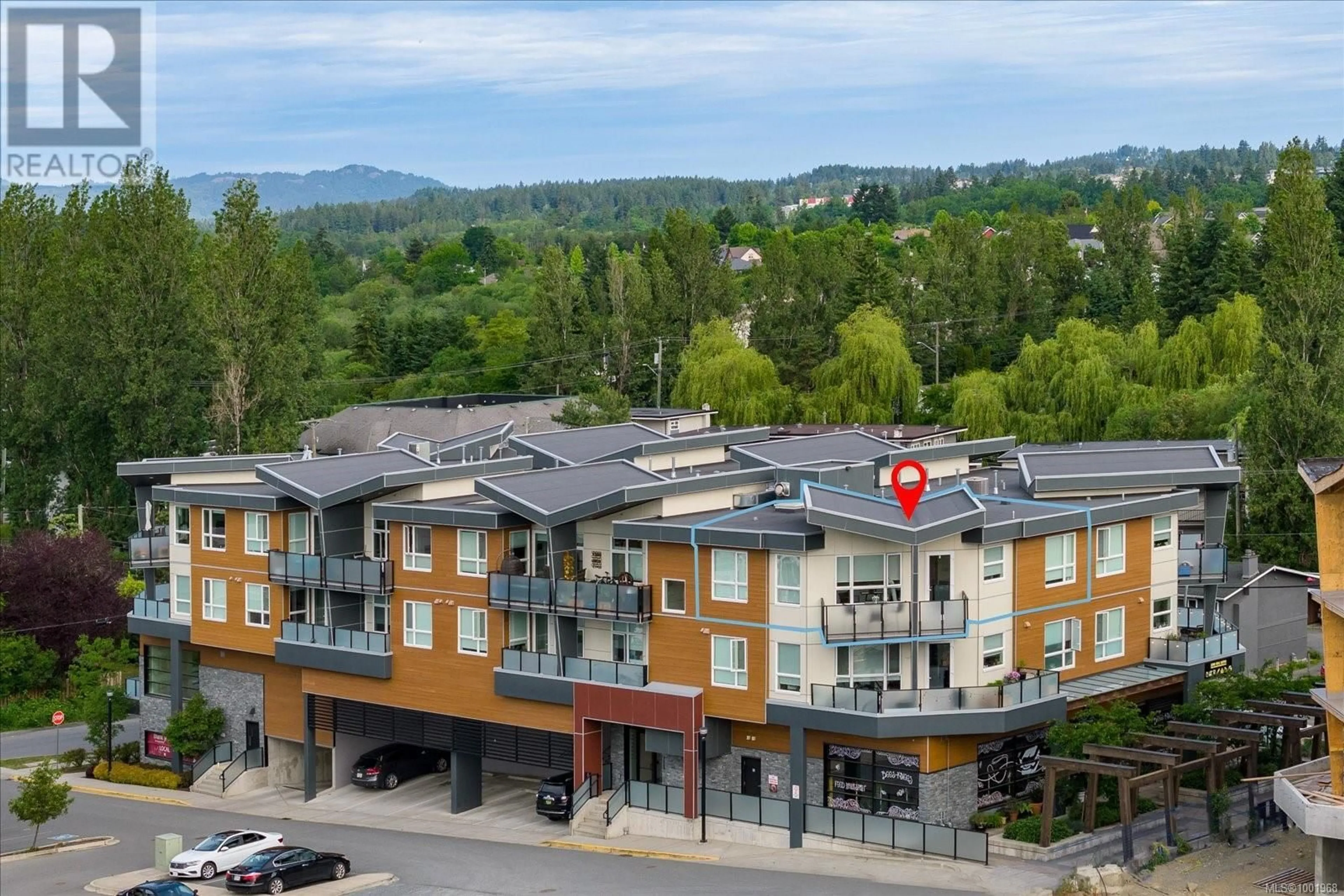 A pic from outside/outdoor area/front of a property/back of a property/a pic from drone, mountain view for 311 - 525 THIRD STREET, Nanaimo British Columbia V9R1W7
