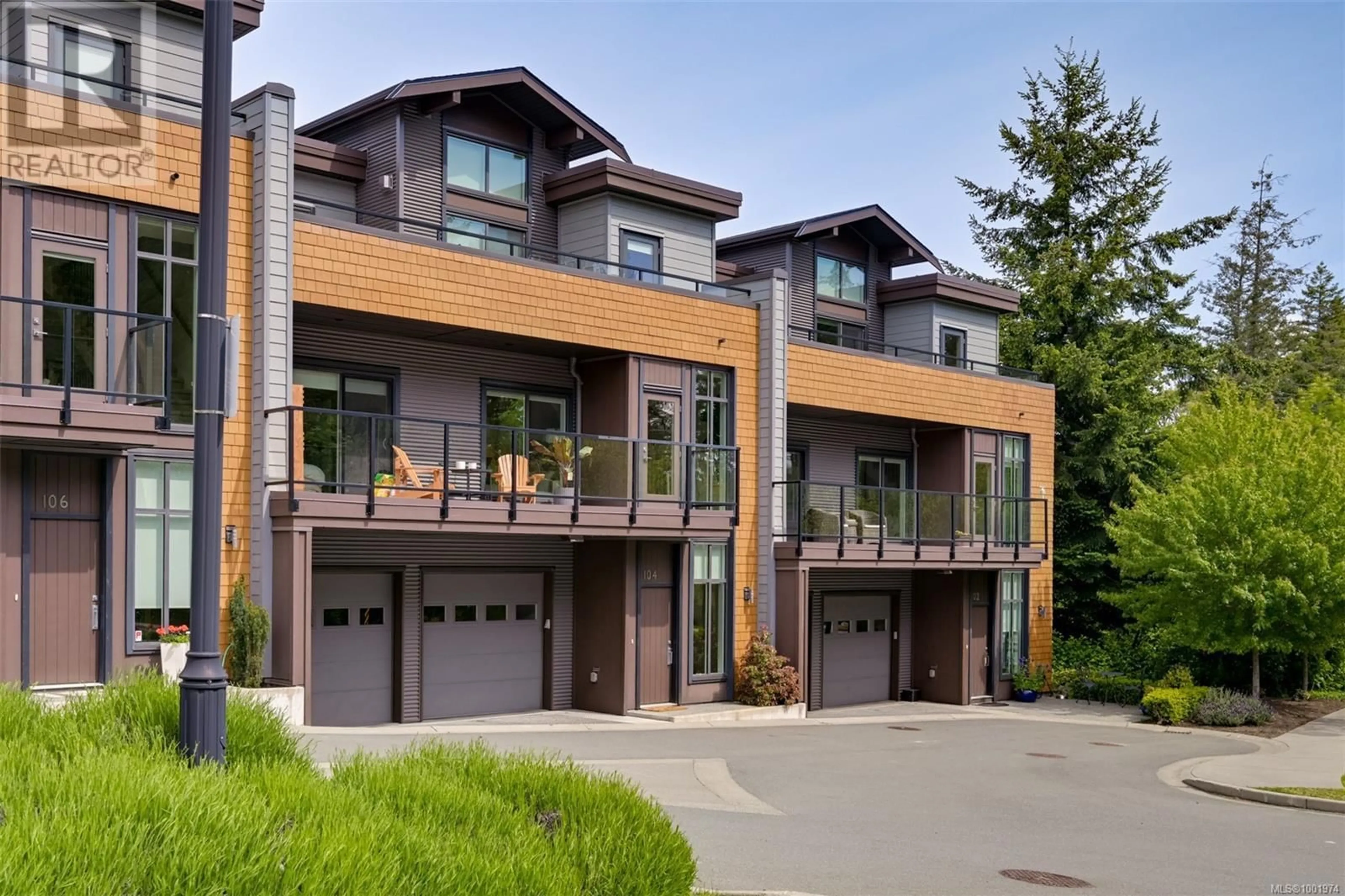 Home with brick exterior material, street for 104 - 1454 BEAR MOUNTAIN PARKWAY, Langford British Columbia V9B0V5