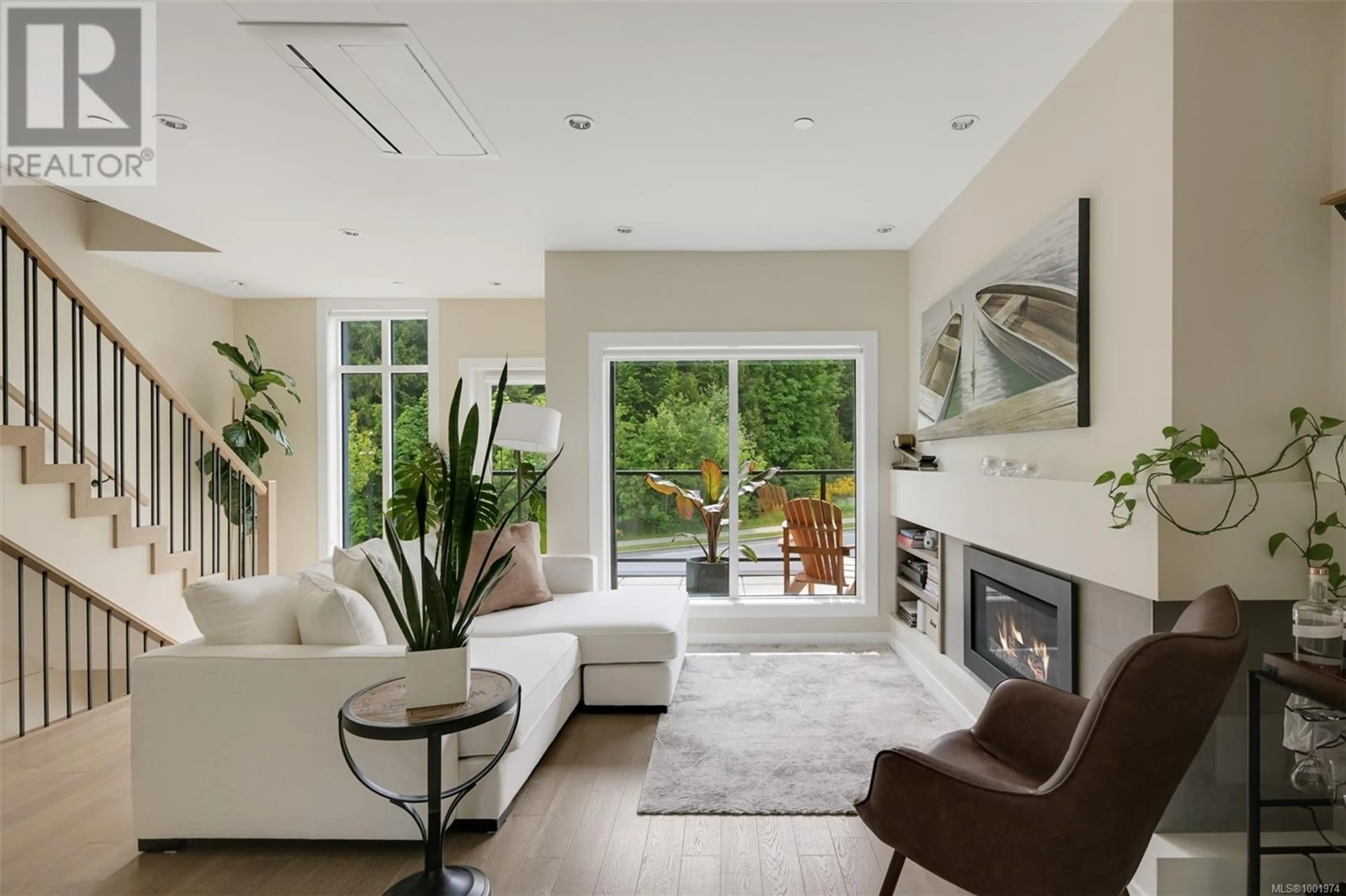 Living room with furniture, unknown for 104 - 1454 BEAR MOUNTAIN PARKWAY, Langford British Columbia V9B0V5