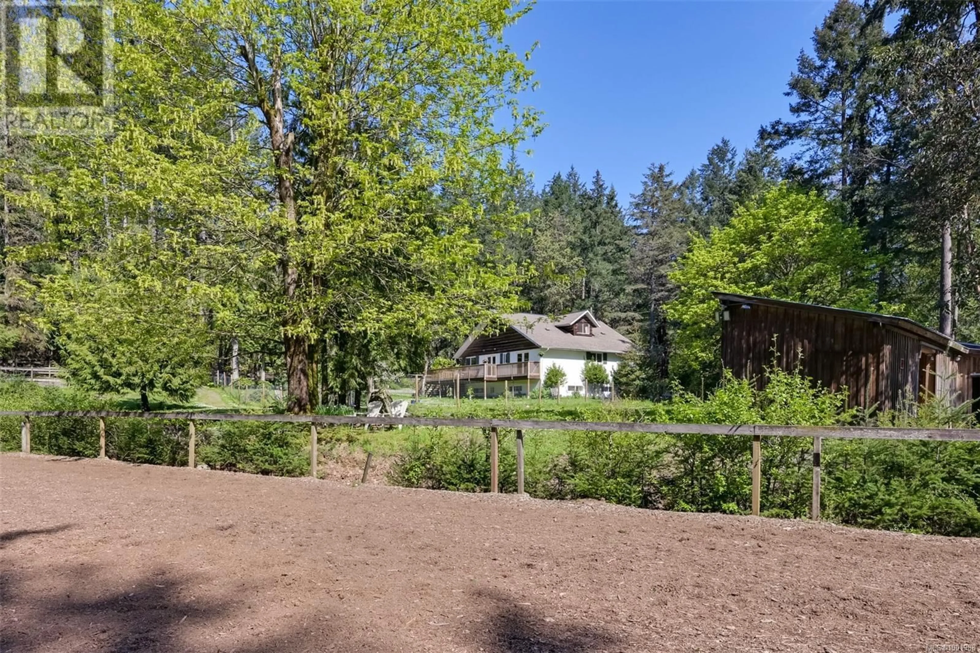 A pic from outside/outdoor area/front of a property/back of a property/a pic from drone, forest/trees view for 5790 BROOKHILL ROAD, Saanich British Columbia V9E2A5