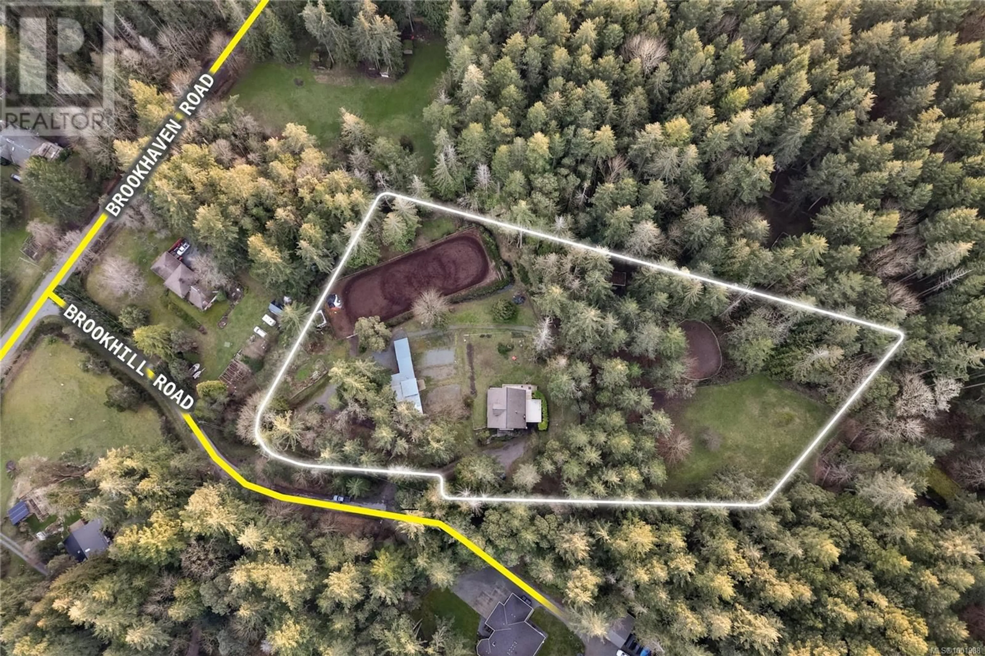 A pic from outside/outdoor area/front of a property/back of a property/a pic from drone, forest/trees view for 5790 BROOKHILL ROAD, Saanich British Columbia V9E2A5