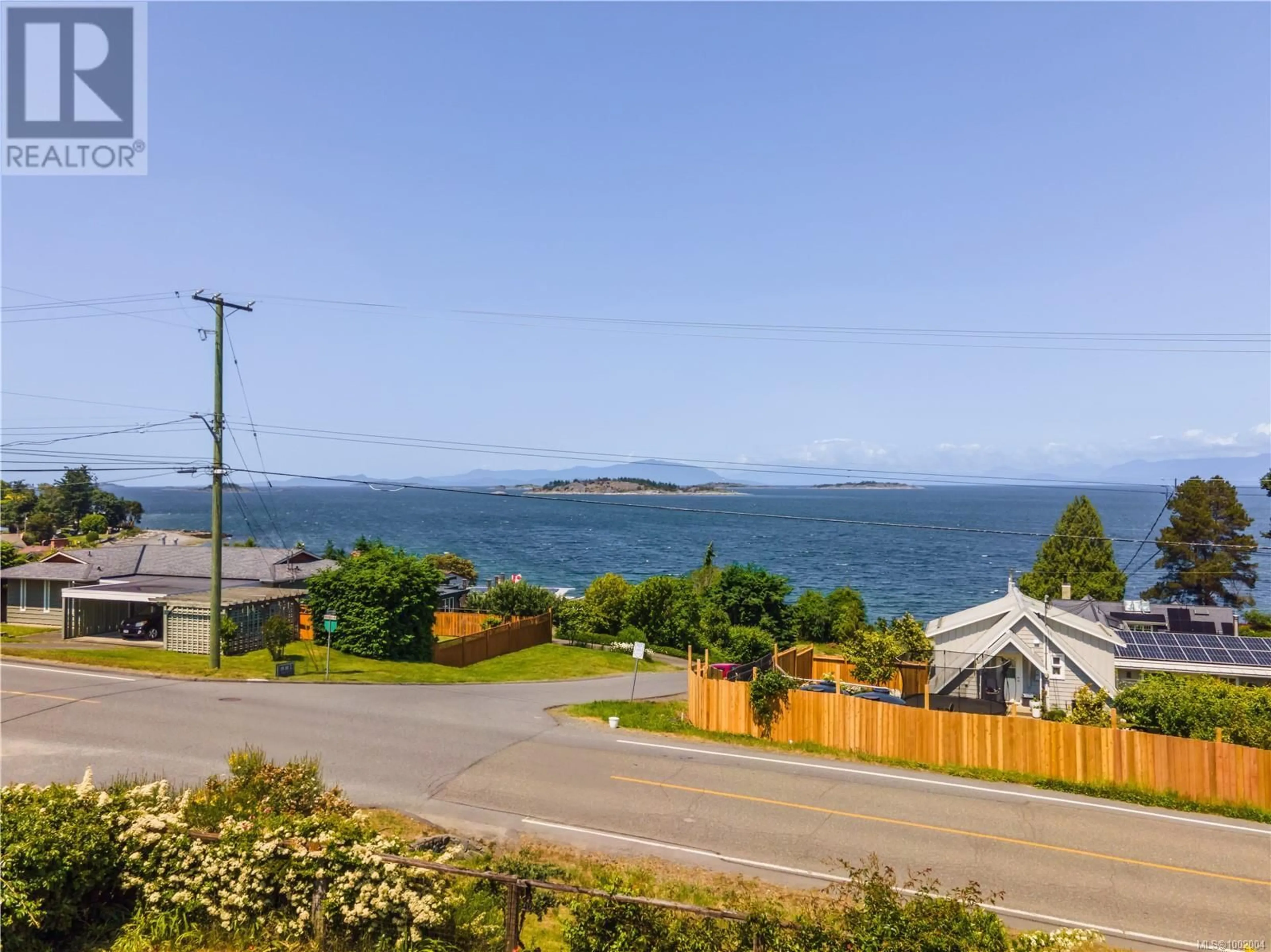 A pic from outside/outdoor area/front of a property/back of a property/a pic from drone, water/lake/river/ocean view for 7034 LAVENDER ROAD, Lantzville British Columbia V0R2H0
