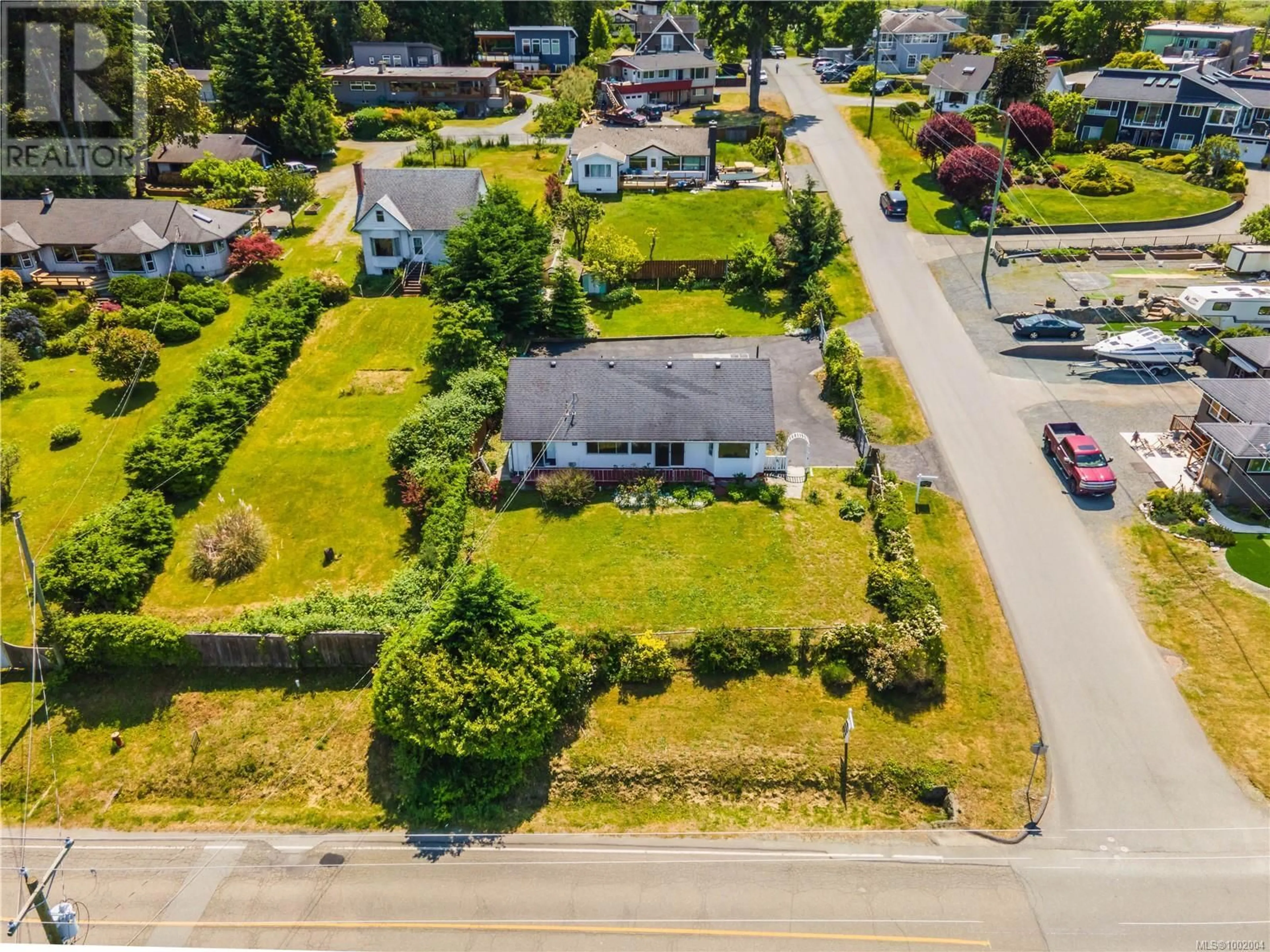 A pic from outside/outdoor area/front of a property/back of a property/a pic from drone, street for 7034 LAVENDER ROAD, Lantzville British Columbia V0R2H0