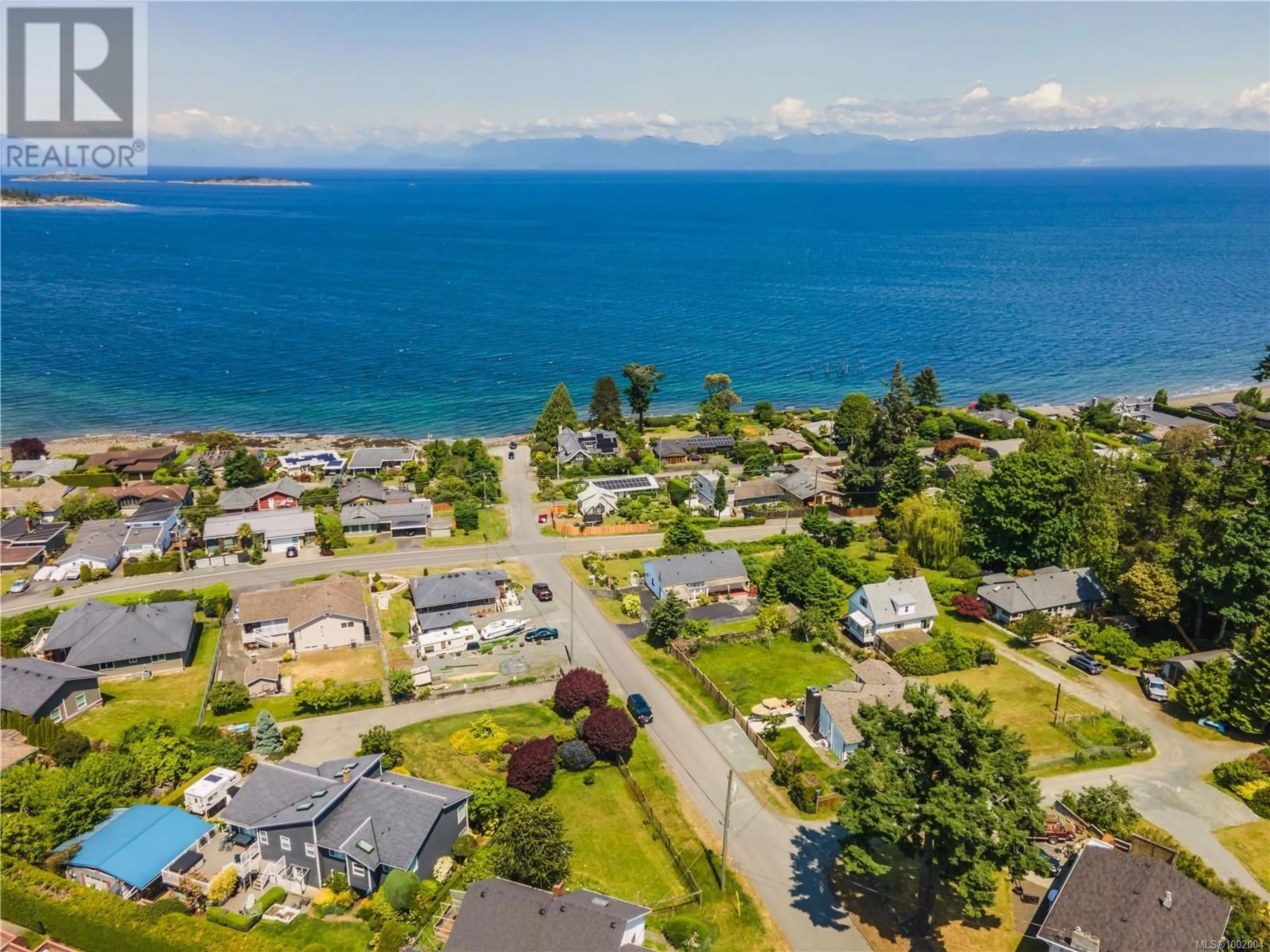 A pic from outside/outdoor area/front of a property/back of a property/a pic from drone, water/lake/river/ocean view for 7034 LAVENDER ROAD, Lantzville British Columbia V0R2H0