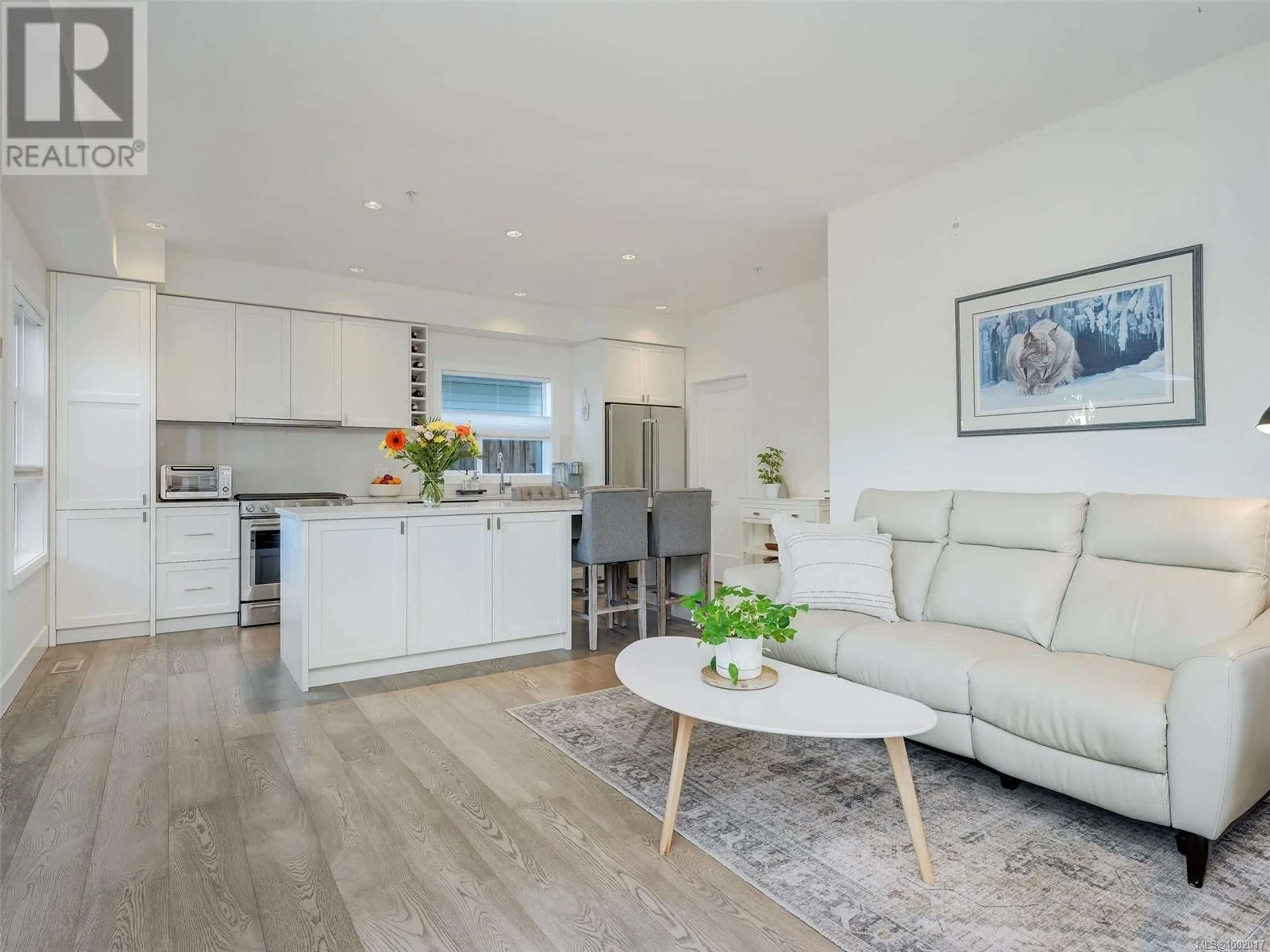 Open concept kitchen, wood/laminate floor for 14 - 9889 SEVENTH STREET, Sidney British Columbia V8L2V8