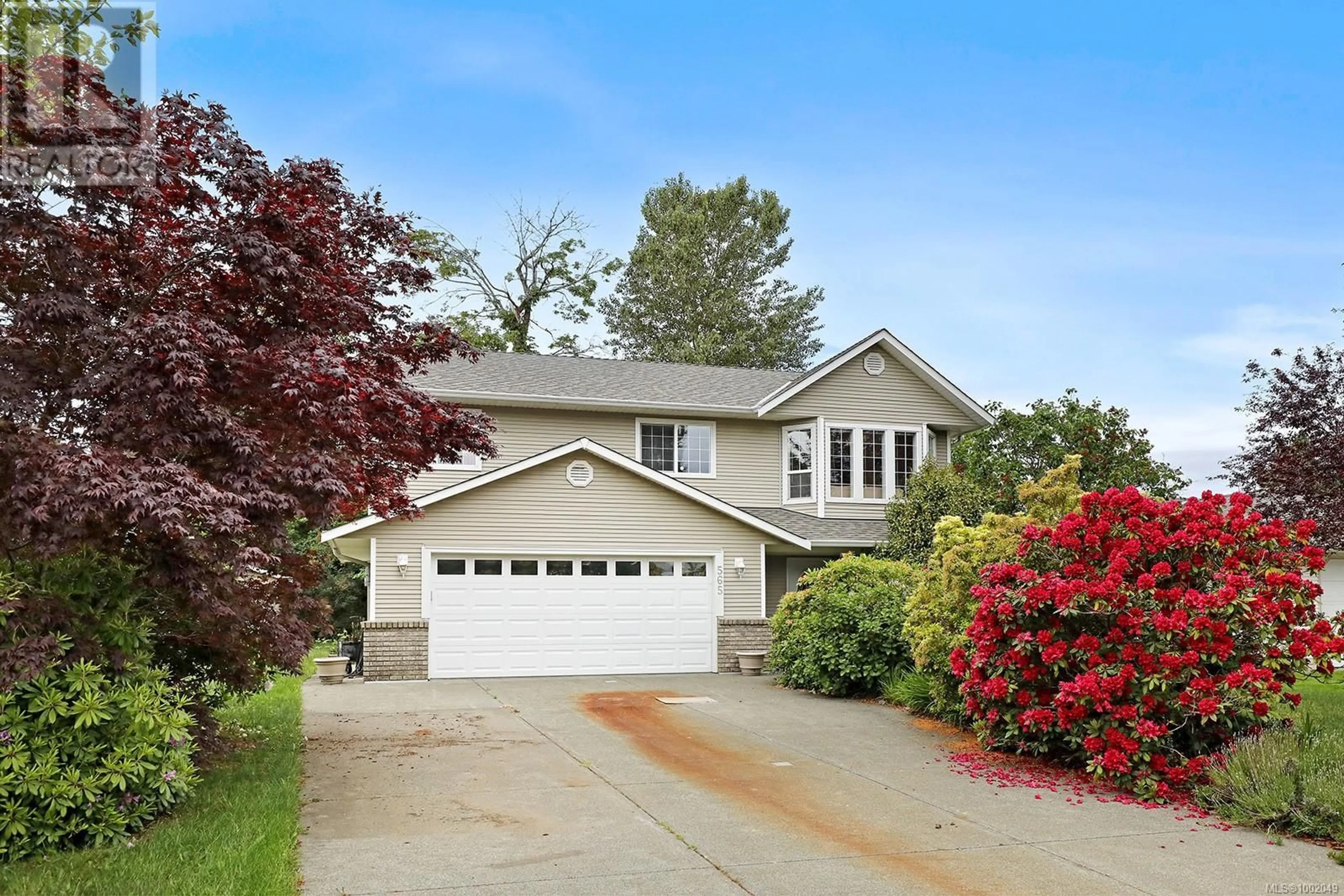 Home with vinyl exterior material, street for 565 HAIDA STREET, Comox British Columbia V9M2L6