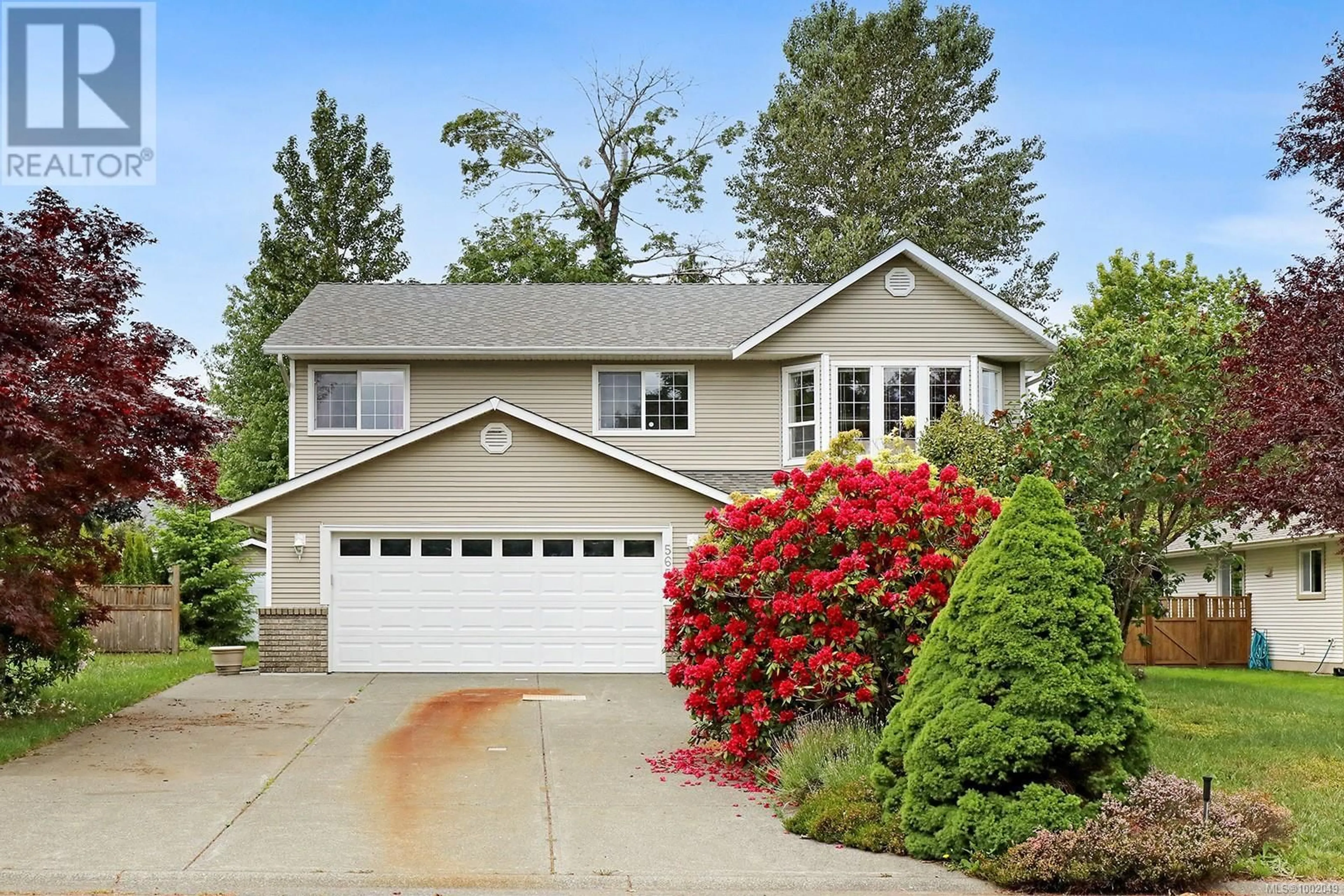Home with vinyl exterior material, street for 565 HAIDA STREET, Comox British Columbia V9M2L6