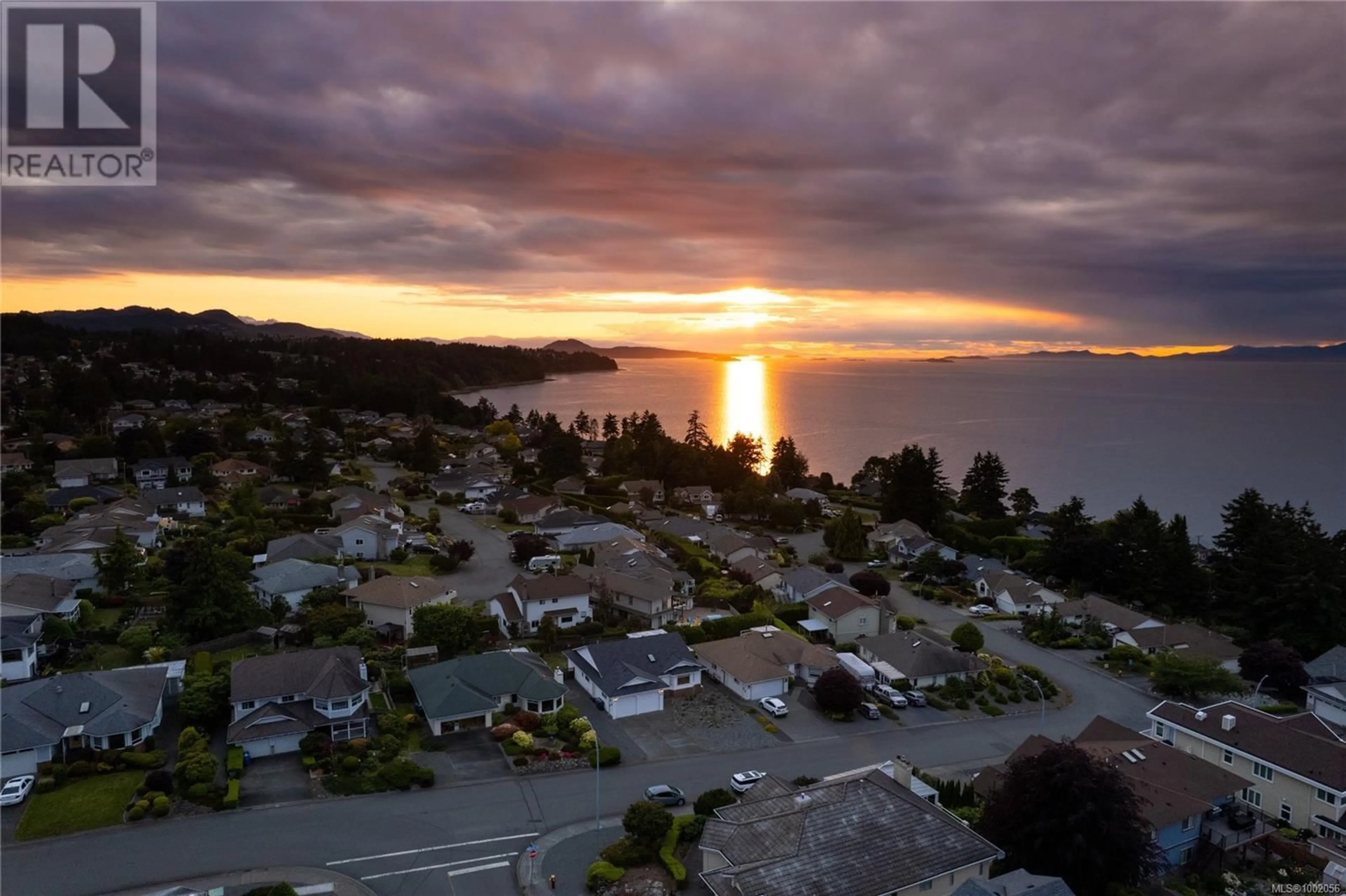 A pic from outside/outdoor area/front of a property/back of a property/a pic from drone, mountain view for 5369 WILLIAMSON ROAD, Nanaimo British Columbia V9V1J9