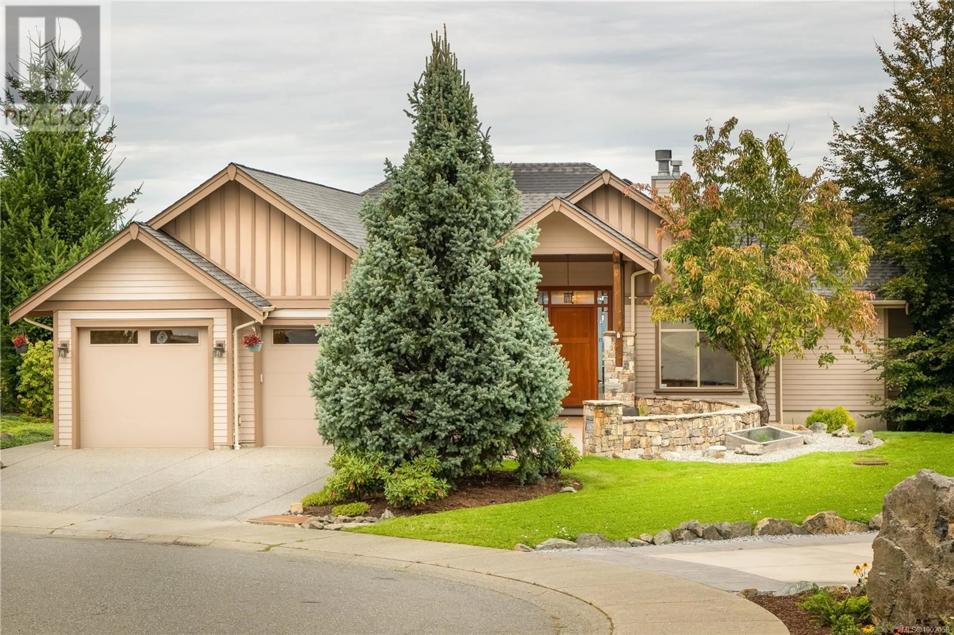 Home with brick exterior material, mountain view for 1067 ROXBORO PLACE, Nanaimo British Columbia V9R7C2