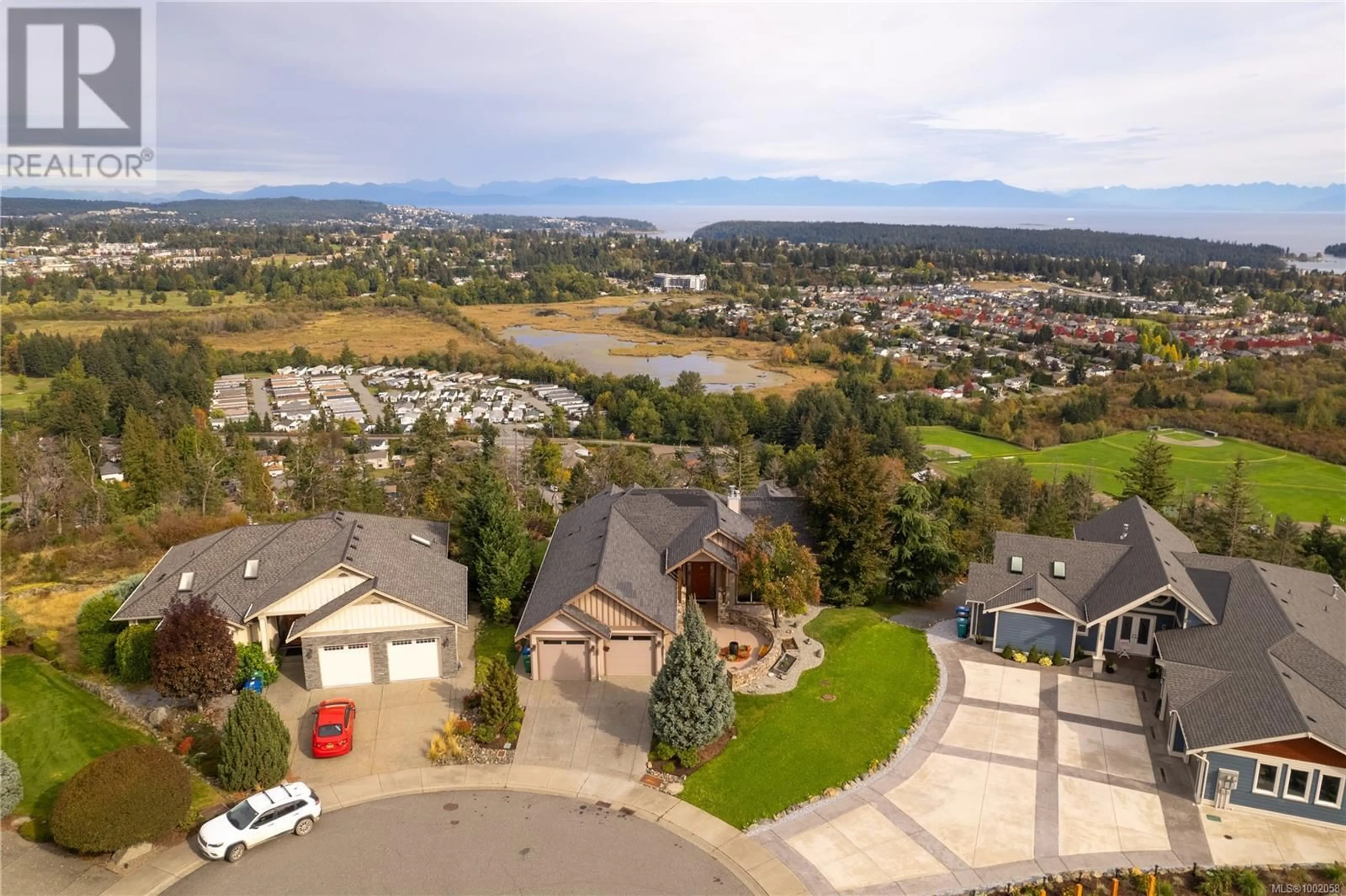 A pic from outside/outdoor area/front of a property/back of a property/a pic from drone, mountain view for 1067 ROXBORO PLACE, Nanaimo British Columbia V9R7C2