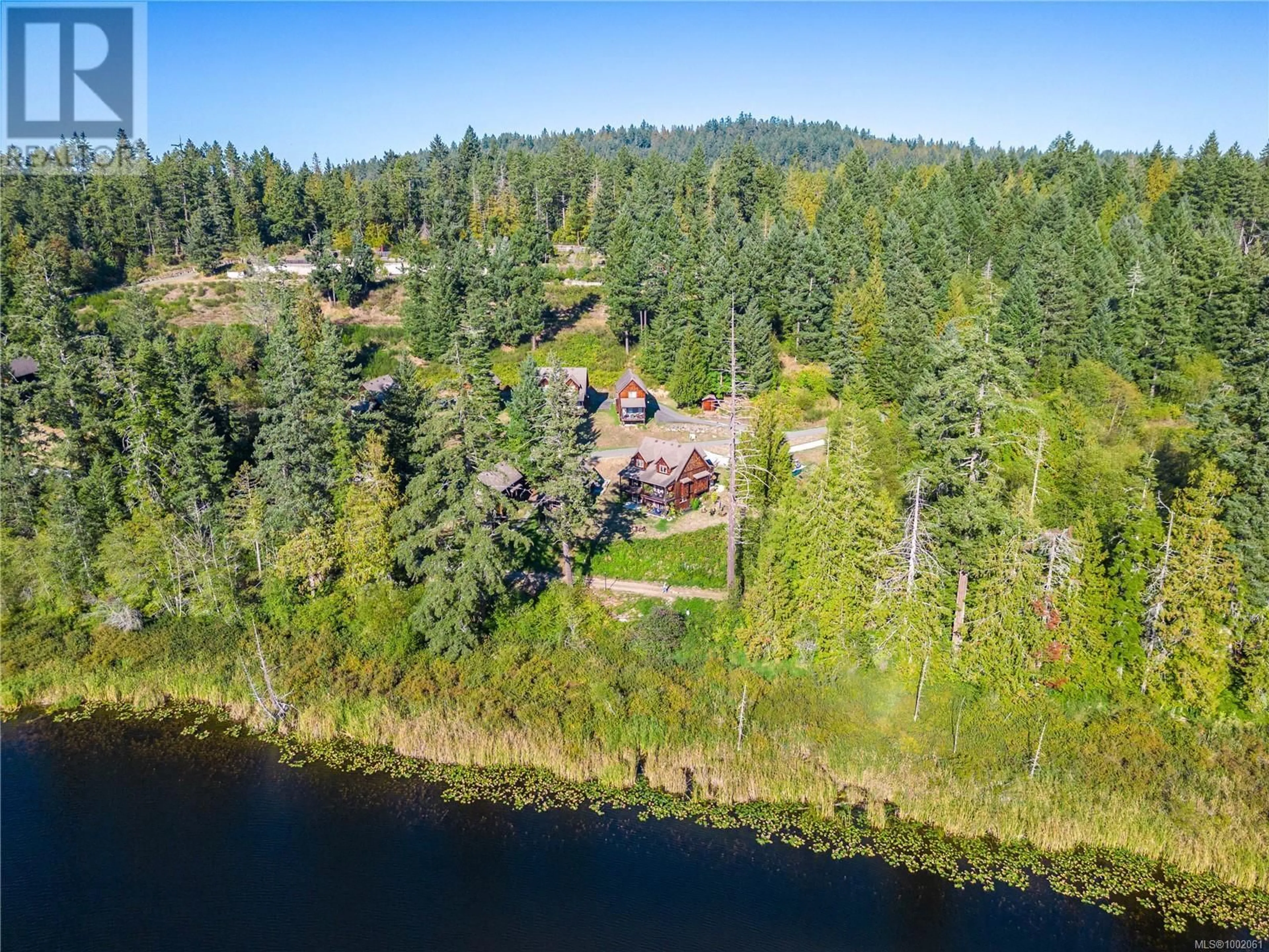 A pic from outside/outdoor area/front of a property/back of a property/a pic from drone, water/lake/river/ocean view for 33 - 315 ROBINSON ROAD, Salt Spring British Columbia V8K1P7