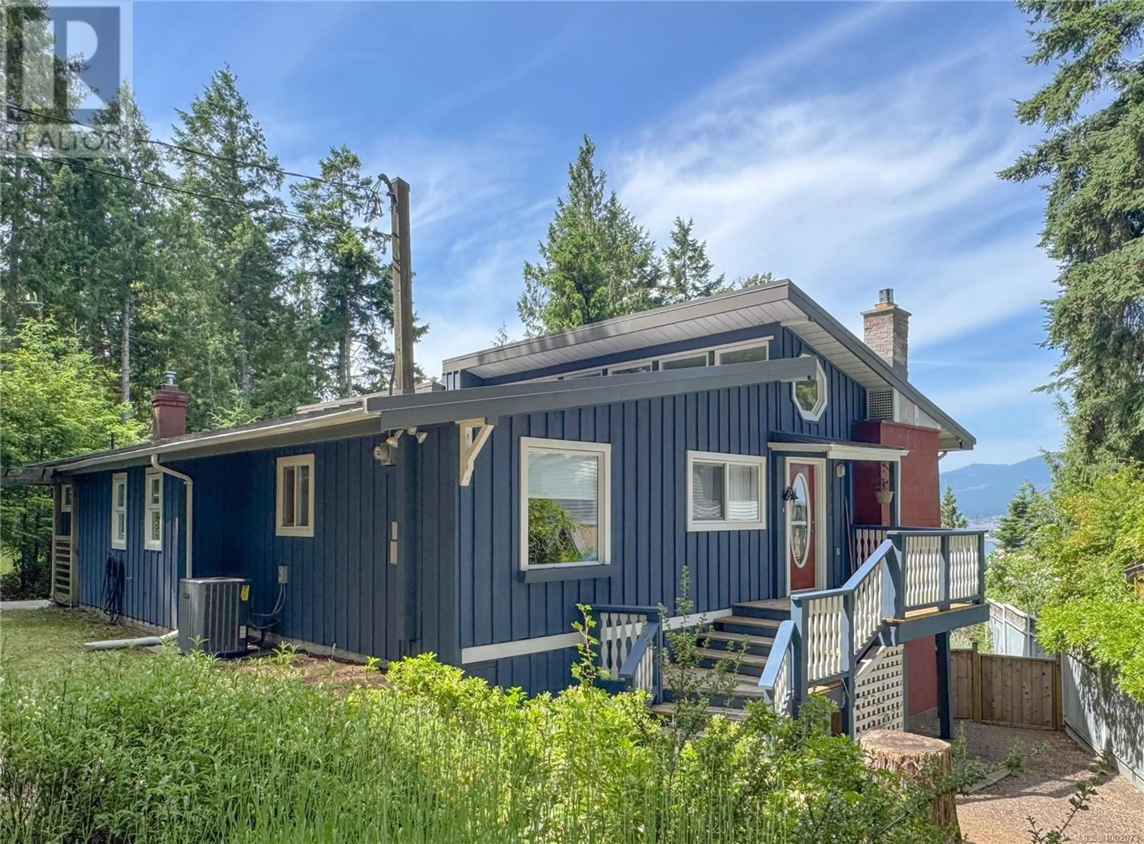 Home with vinyl exterior material, street for 1105 PAT BURNS AVENUE, Gabriola Island British Columbia V0R1X2