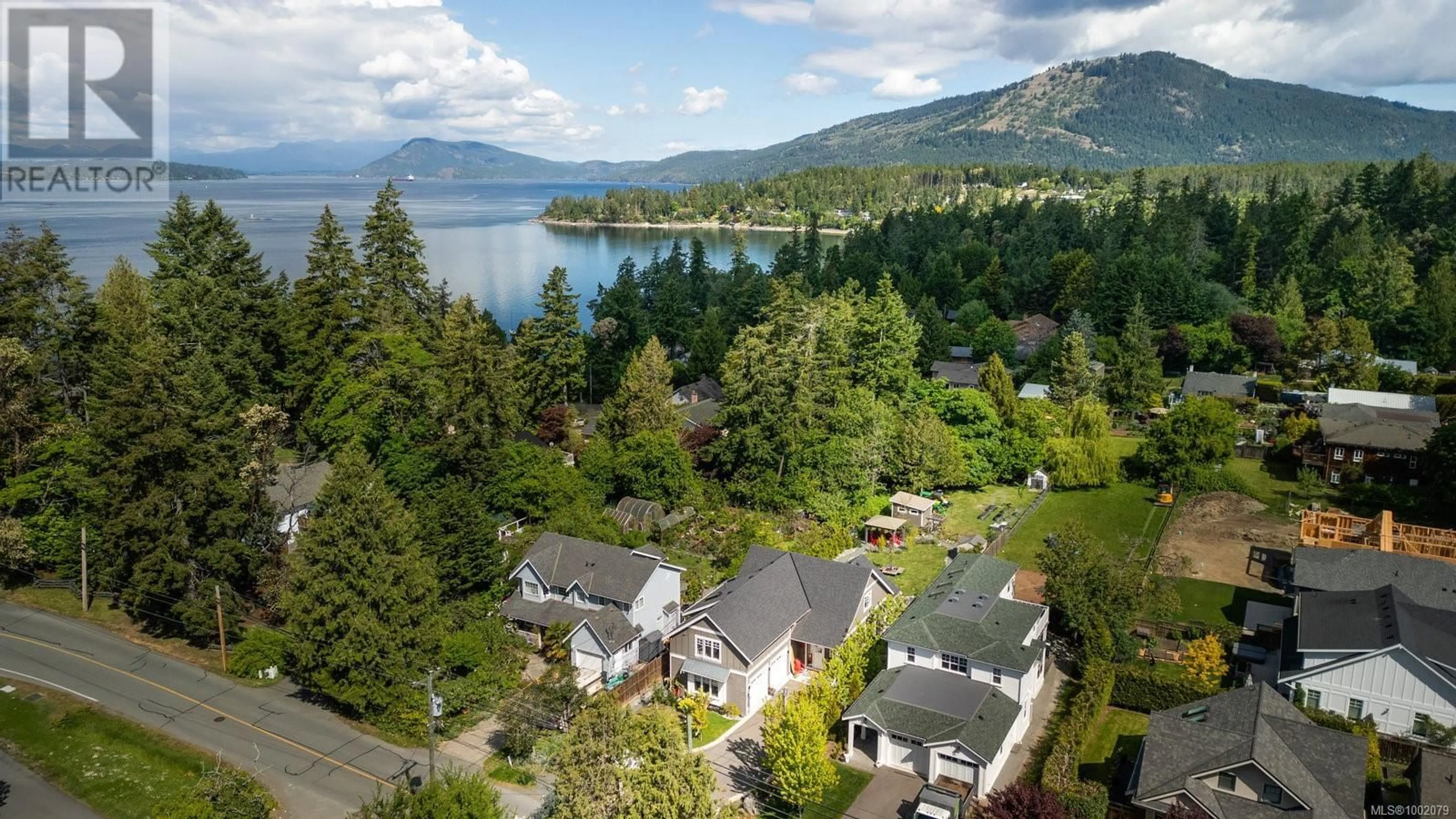 A pic from outside/outdoor area/front of a property/back of a property/a pic from drone, water/lake/river/ocean view for 648 BIRCH ROAD, North Saanich British Columbia V8L5S2
