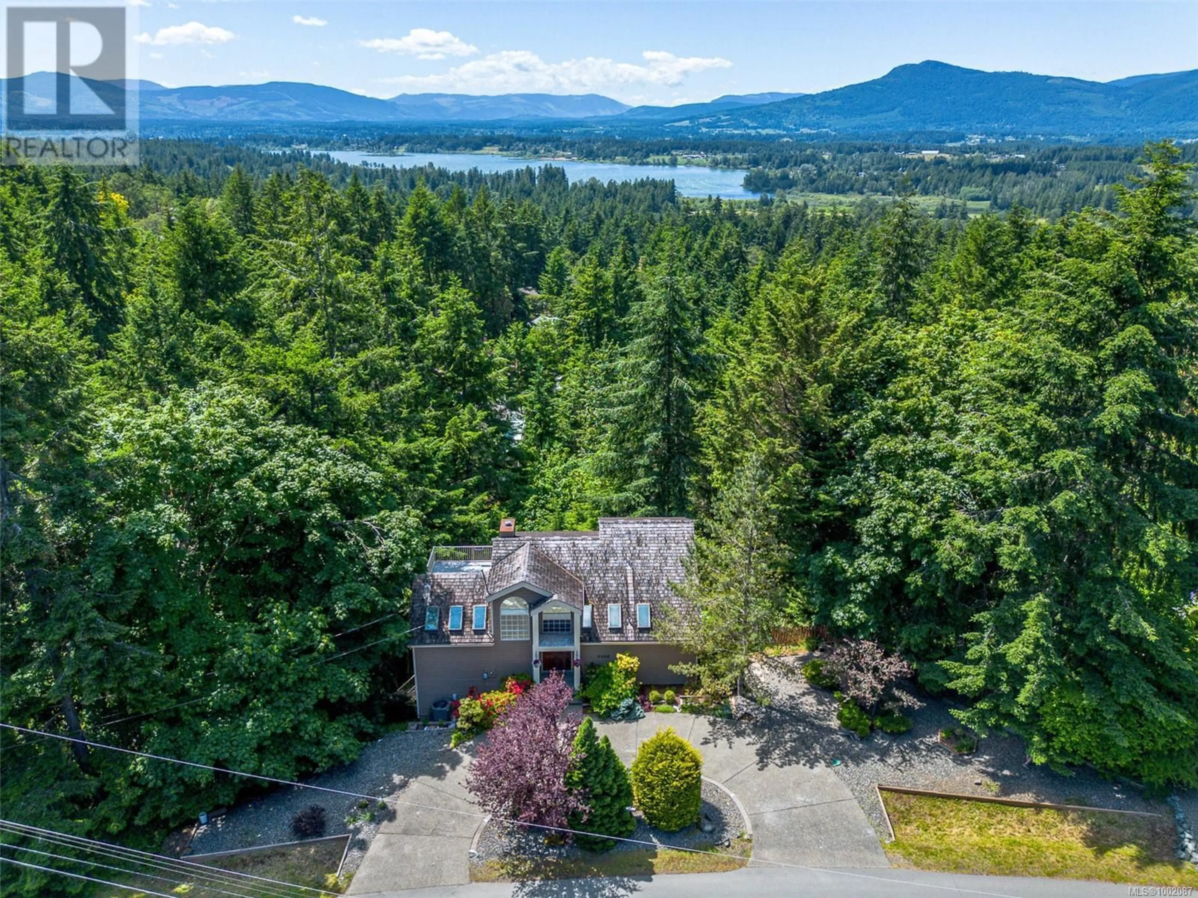 A pic from outside/outdoor area/front of a property/back of a property/a pic from drone, water/lake/river/ocean view for 6488 NEVILANE DRIVE, Duncan British Columbia V9L5S6