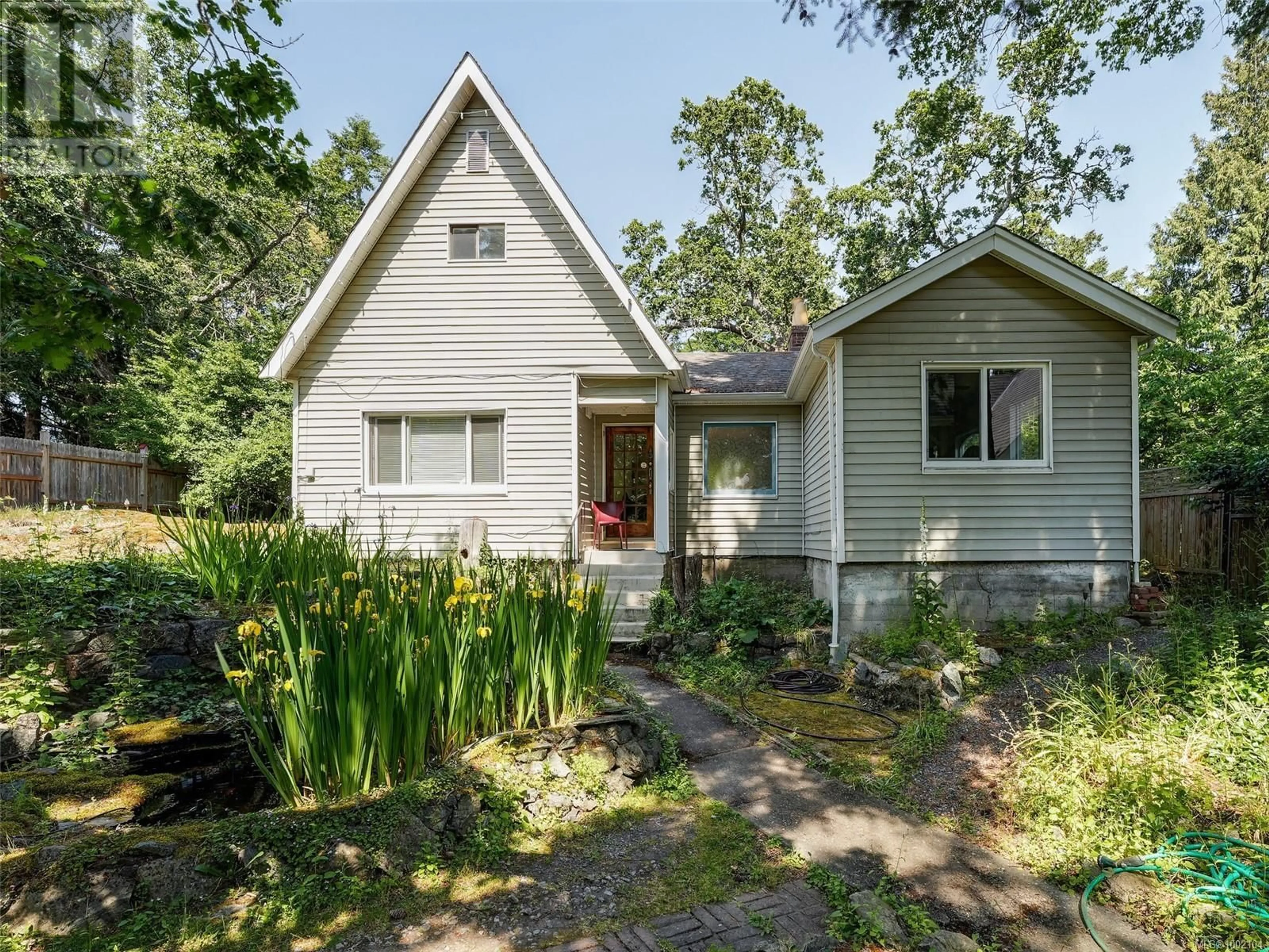 Home with vinyl exterior material, street for 2784 TUDOR AVENUE, Saanich British Columbia V8N1L7