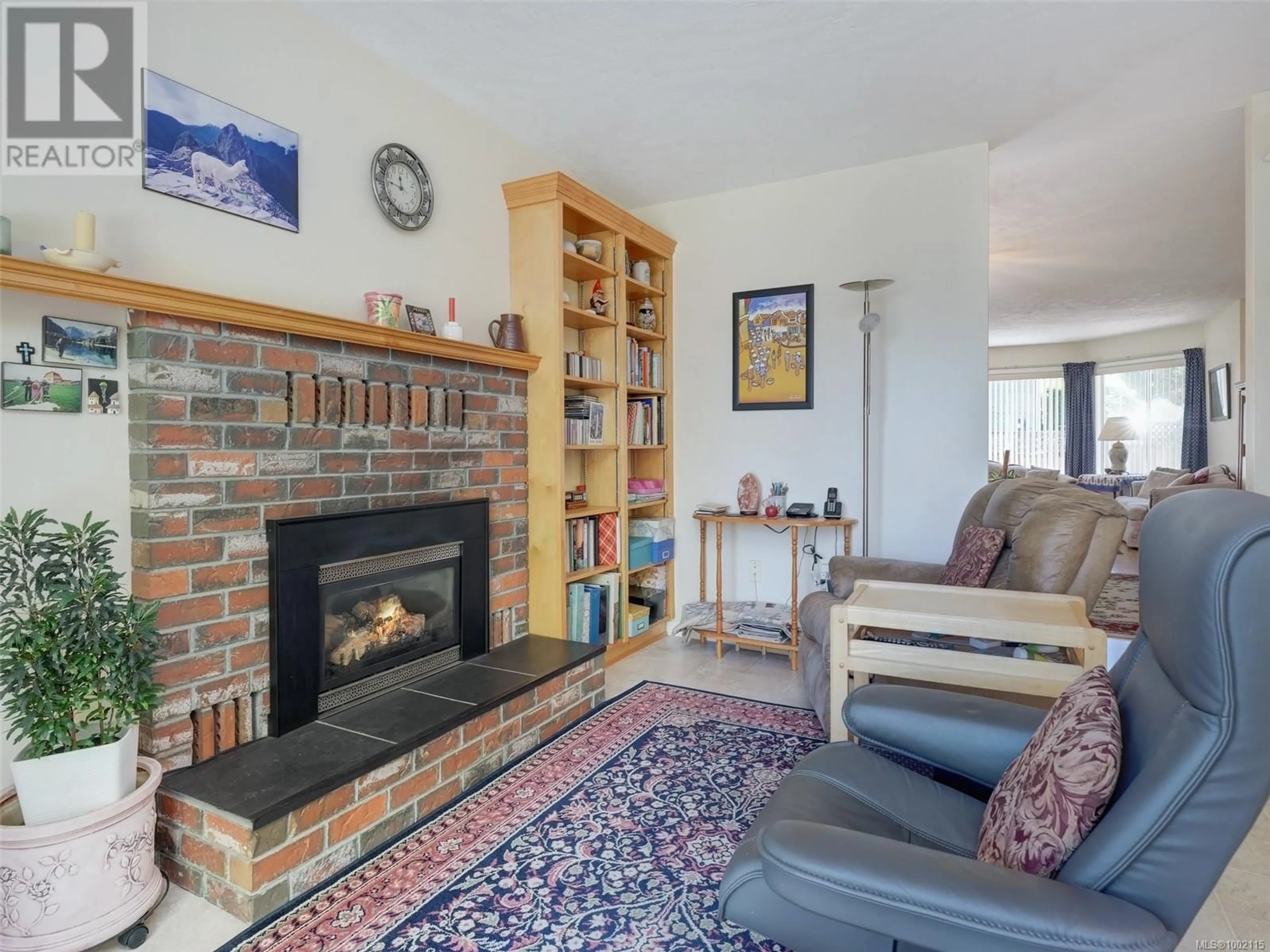 Living room with furniture, unknown for 6797 WENDONNA PLACE, Central Saanich British Columbia V8M1A6