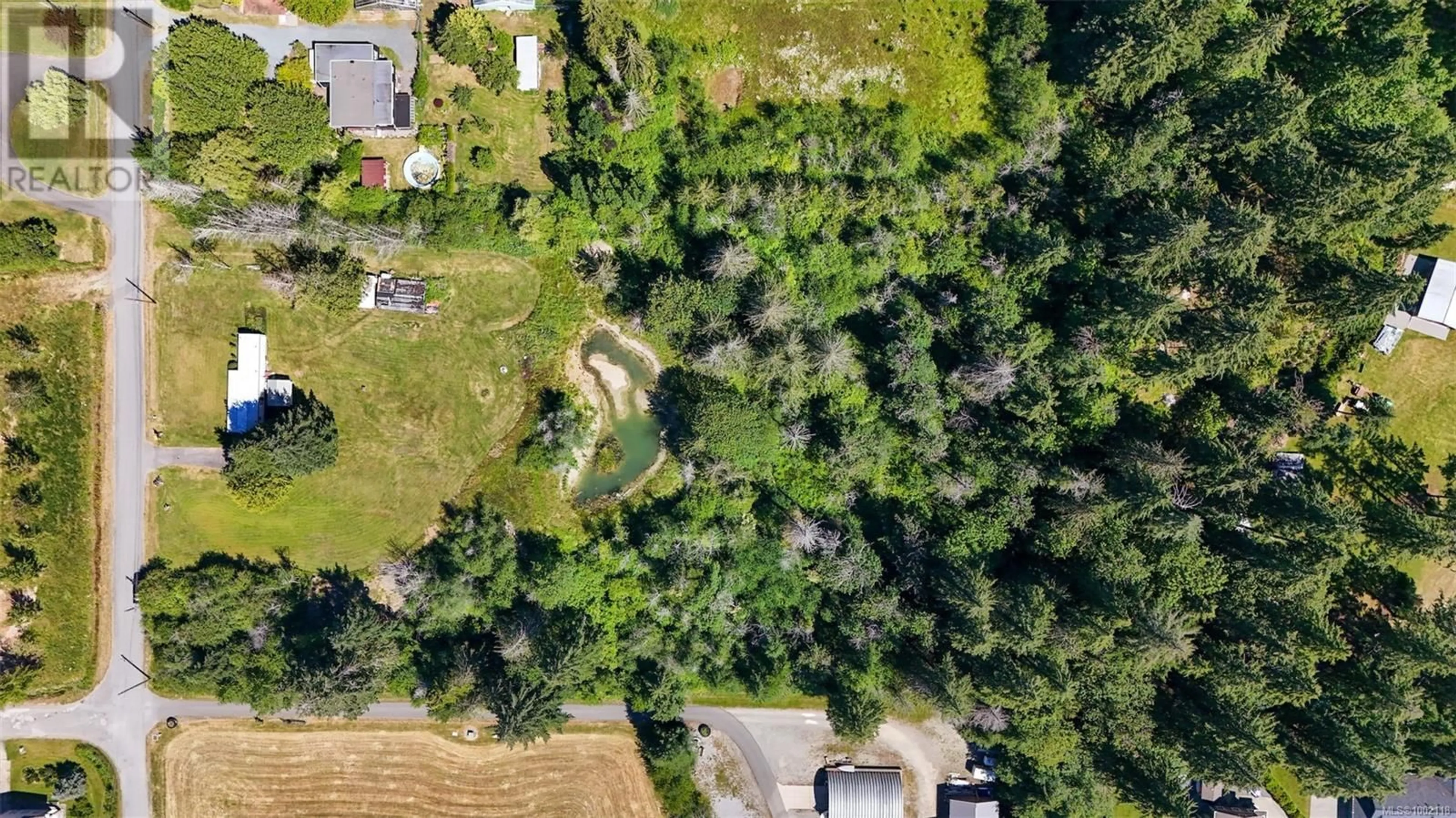 A pic from outside/outdoor area/front of a property/back of a property/a pic from drone, forest/trees view for 5611 STRICK ROAD, Port Alberni British Columbia V9Y8W4