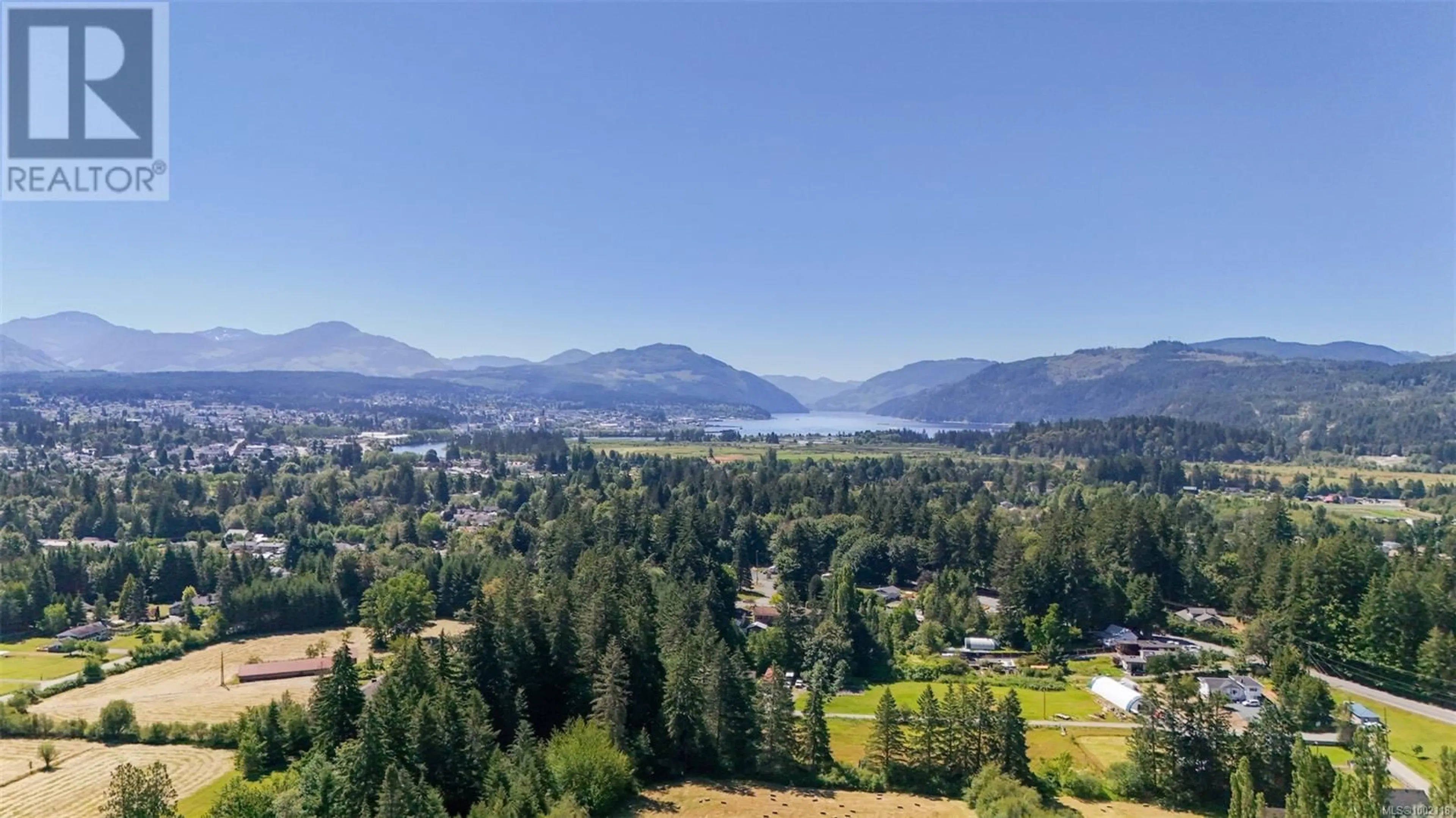 A pic from outside/outdoor area/front of a property/back of a property/a pic from drone, water/lake/river/ocean view for 5611 STRICK ROAD, Port Alberni British Columbia V9Y8W4