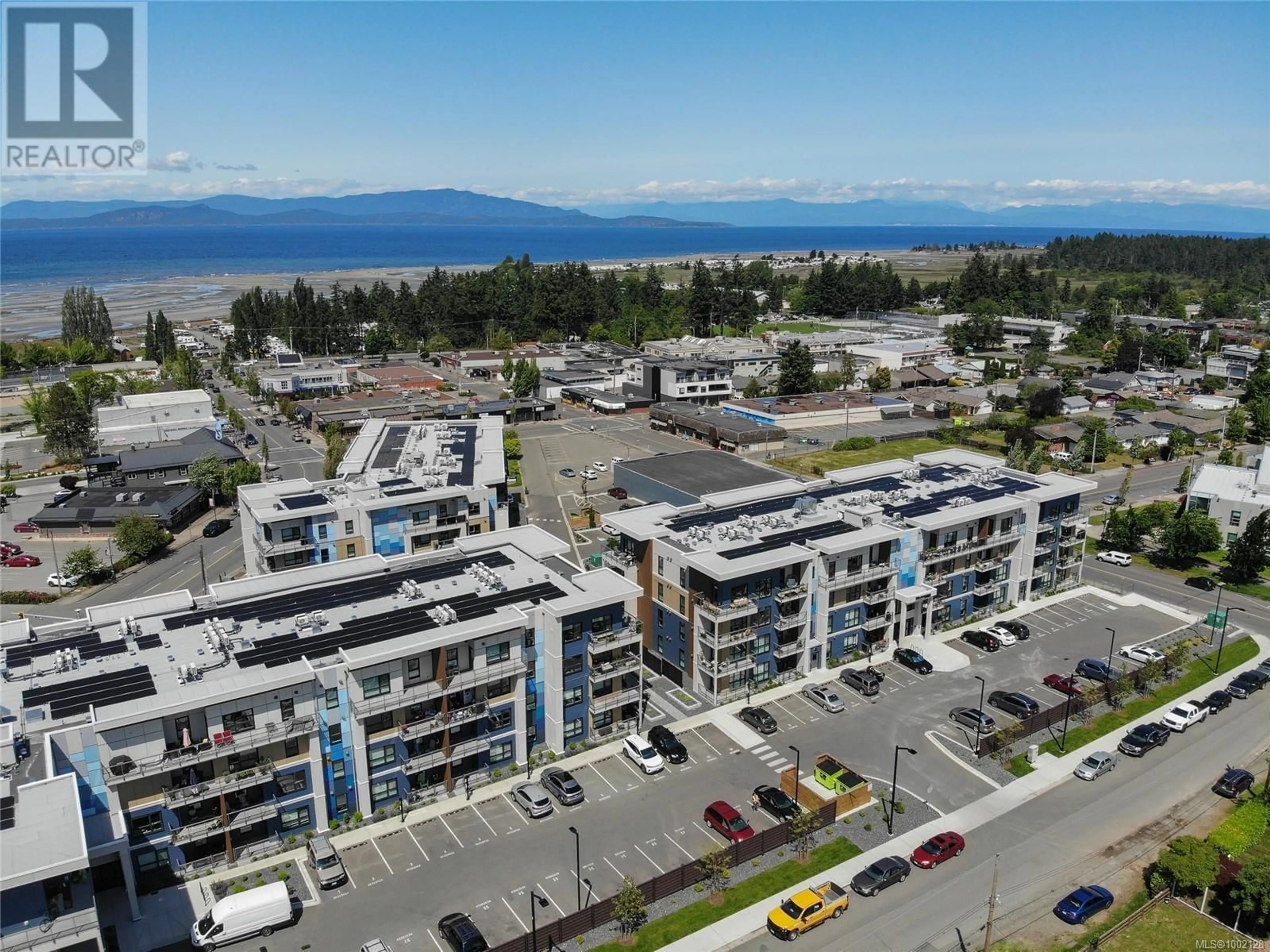 A pic from outside/outdoor area/front of a property/back of a property/a pic from drone, mountain view for 409 - 120 JENSEN AVENUE, Parksville British Columbia V9P0H6