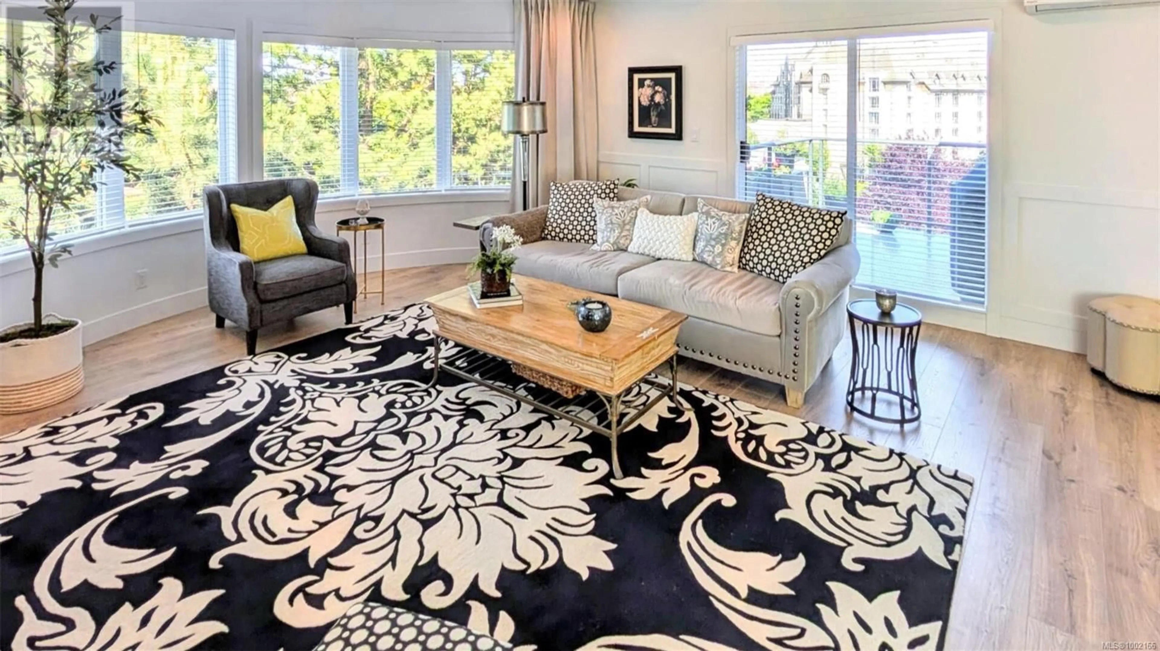 Living room with furniture, carpet floor for 516 - 50 SONGHEES ROAD, Victoria British Columbia V9A7J4