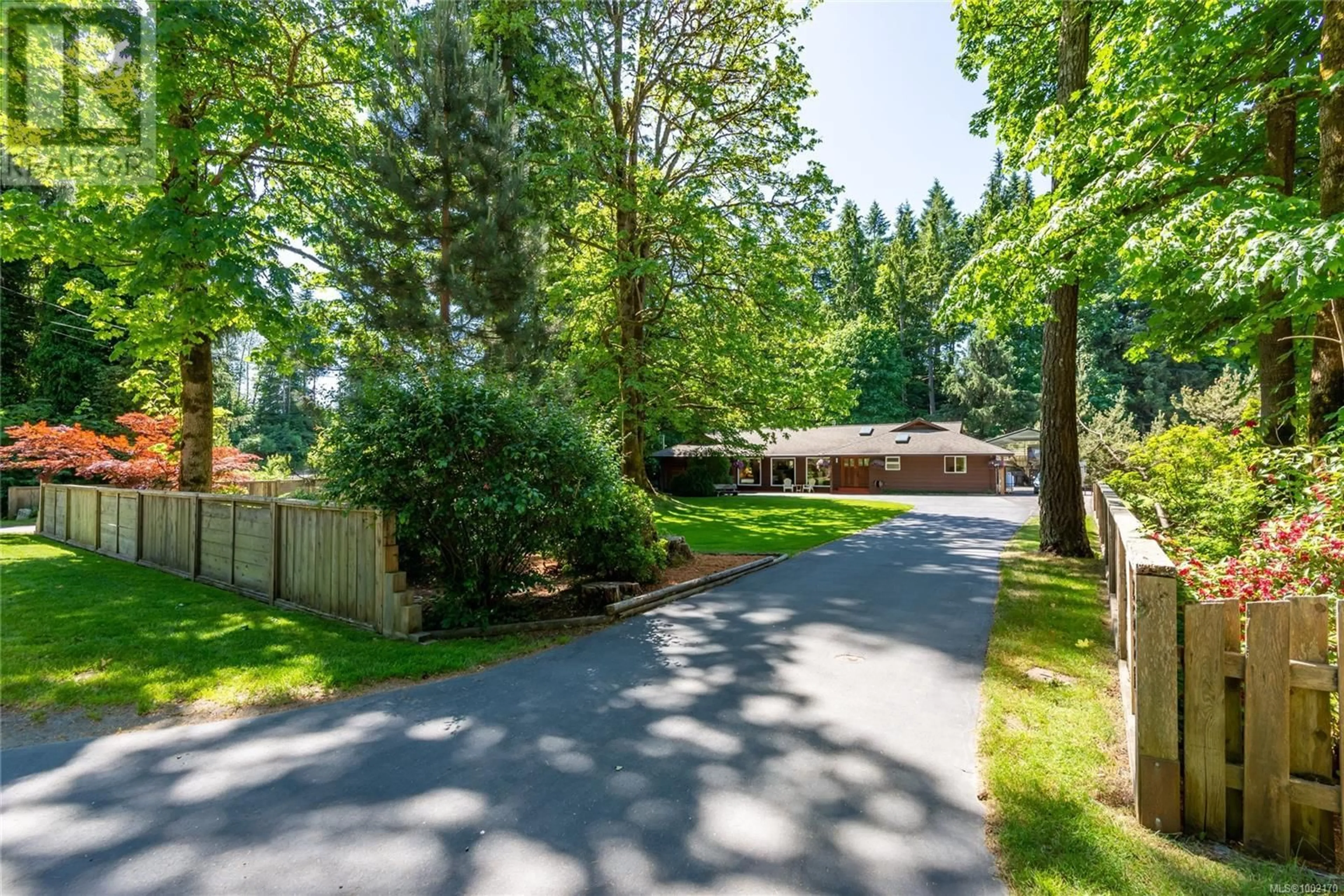 A pic from outside/outdoor area/front of a property/back of a property/a pic from drone, forest/trees view for 2531 CAMPBELL RIVER ROAD, Campbell River British Columbia V9W4P1