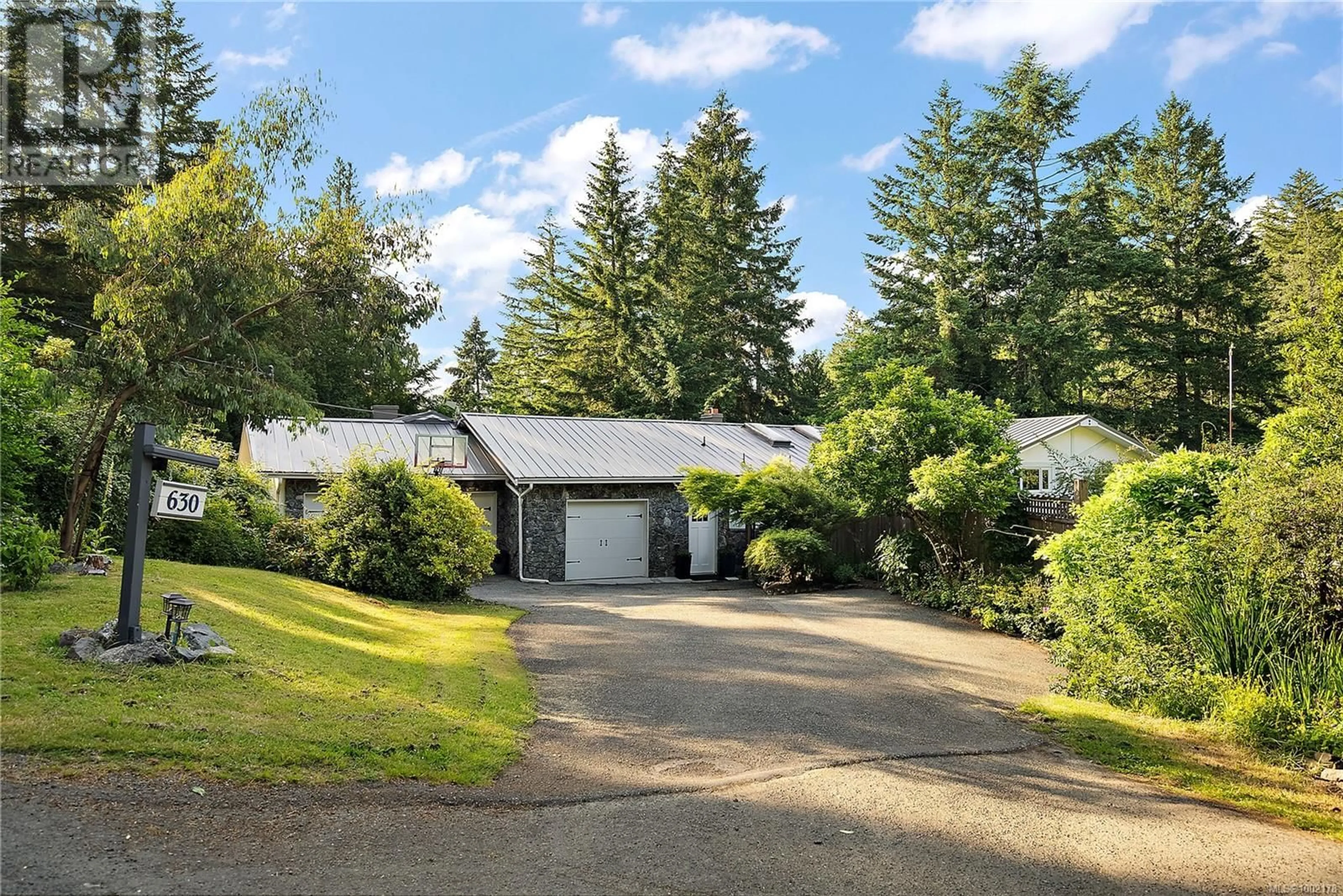 A pic from outside/outdoor area/front of a property/back of a property/a pic from drone, street for 630 SENANUS DRIVE, Central Saanich British Columbia V8M1S5