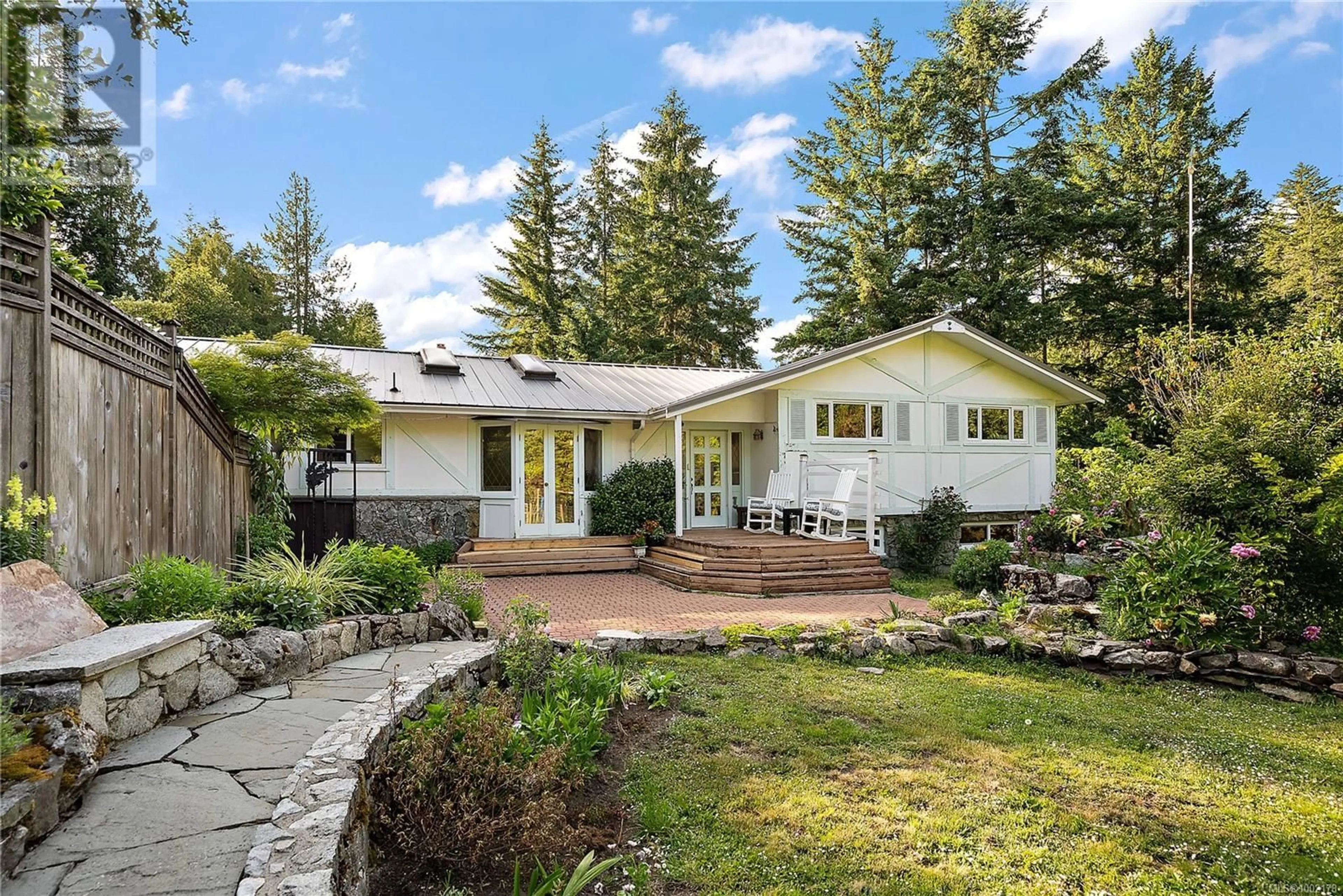 Home with vinyl exterior material, street for 630 SENANUS DRIVE, Central Saanich British Columbia V8M1S5