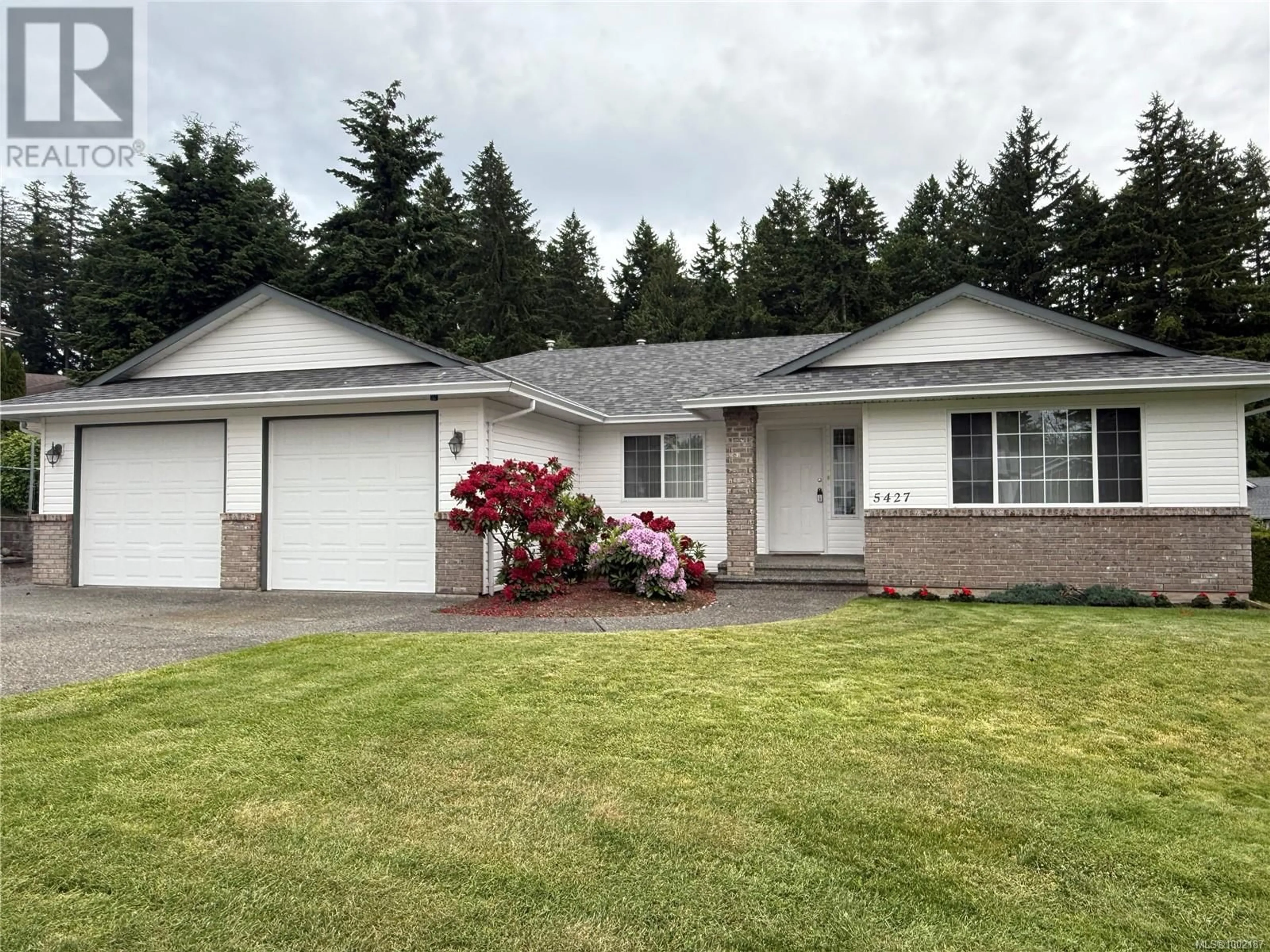 Home with vinyl exterior material, street for 5427 COLINWOOD DRIVE, Nanaimo British Columbia V9T6G2