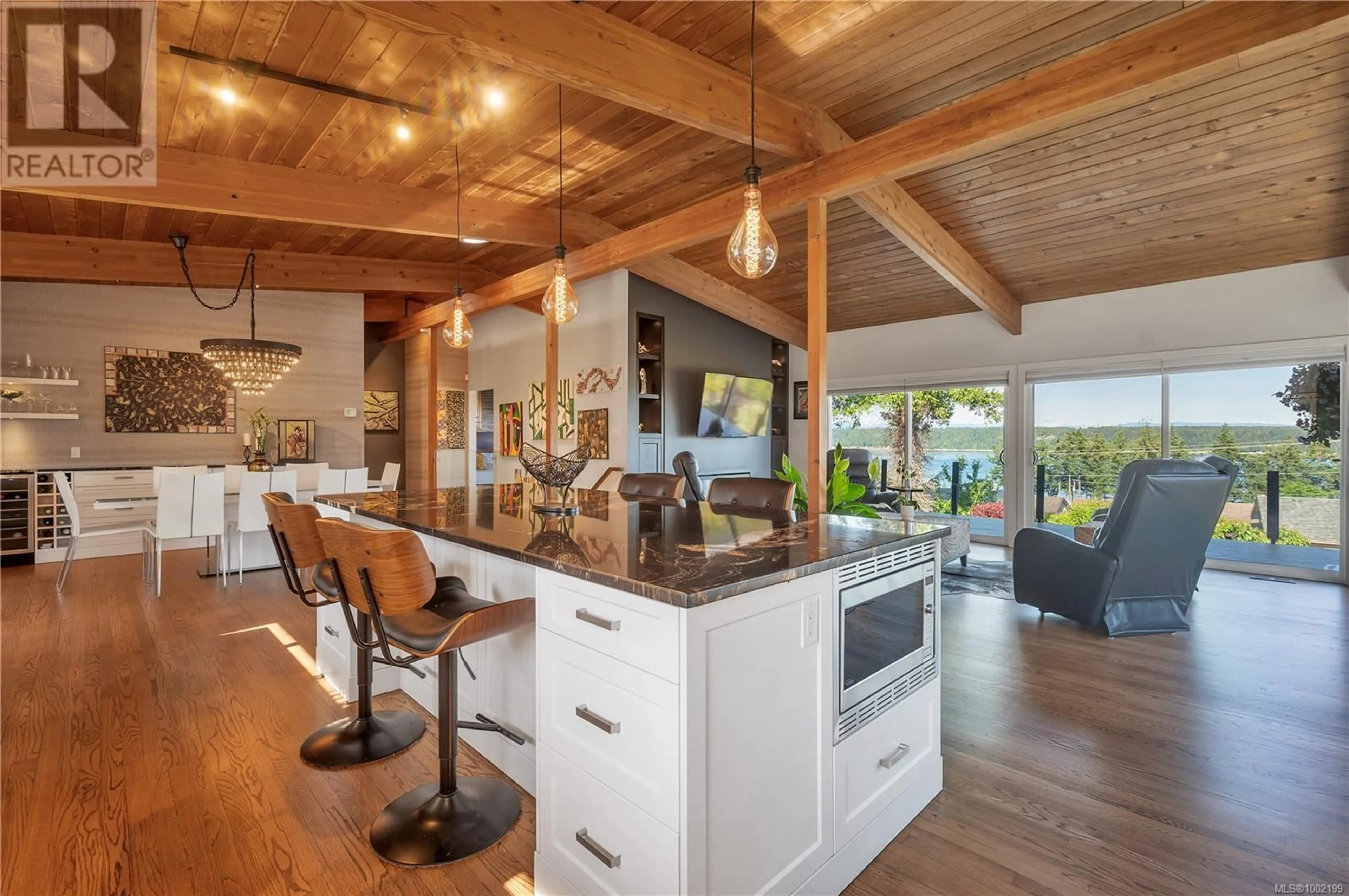 Open concept kitchen, wood/laminate floor for 235 THULIN STREET SOUTH, Campbell River British Columbia V9W2J9