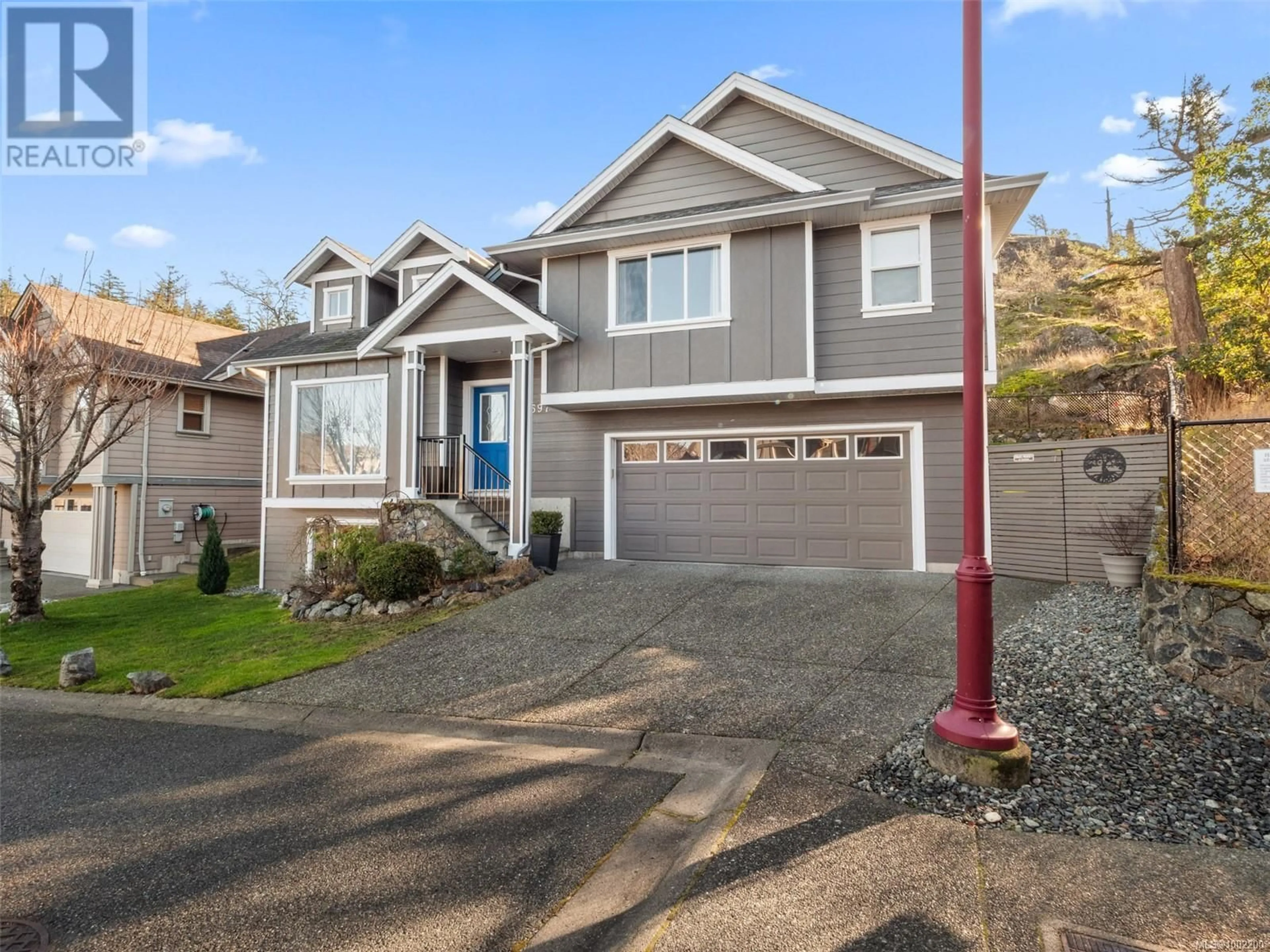 Home with vinyl exterior material, street for 2597 LEGACY RIDGE, Langford British Columbia V9B0A1