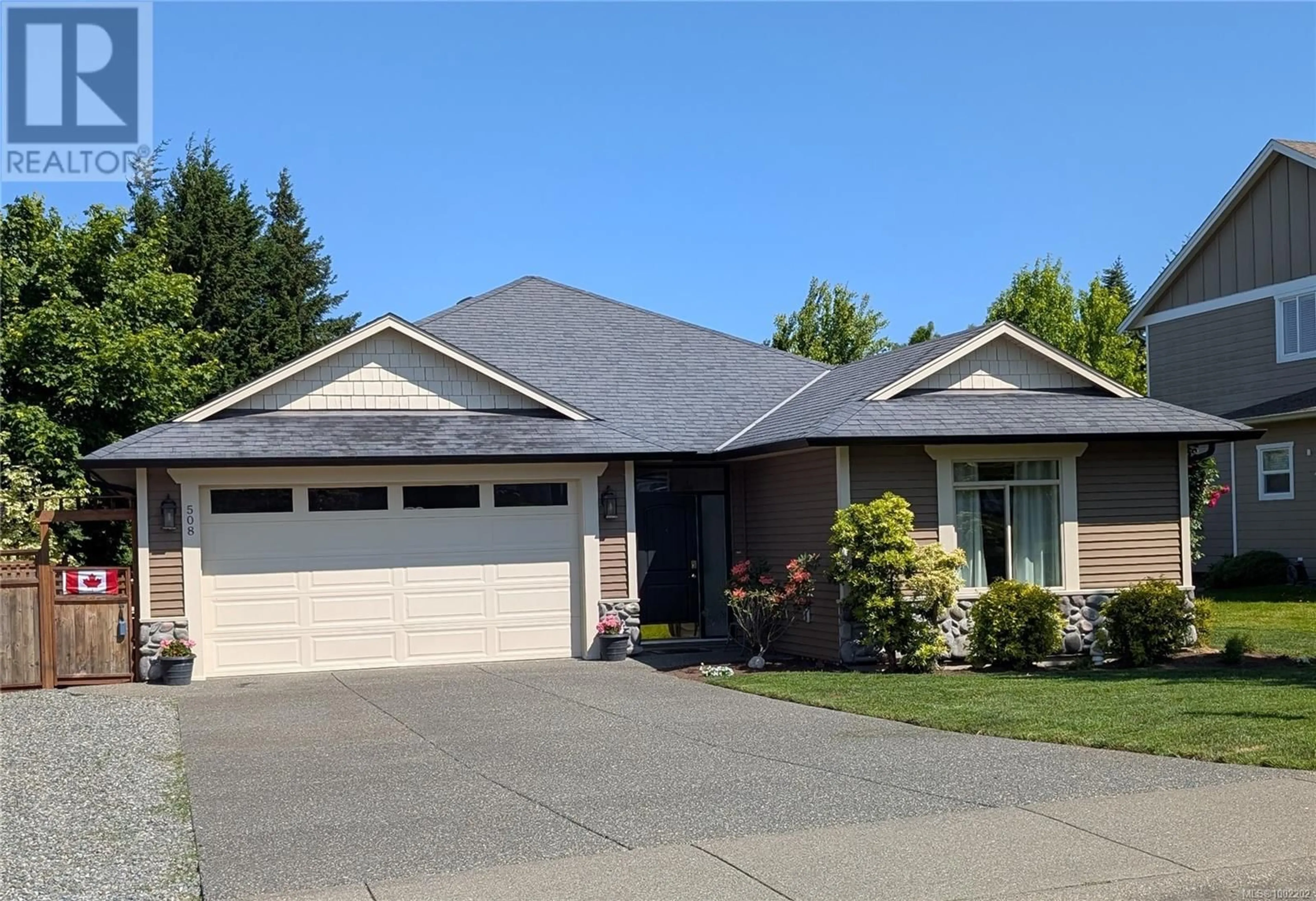 Home with vinyl exterior material, street for 508 SPITFIRE DRIVE, Comox British Columbia V9M0A7