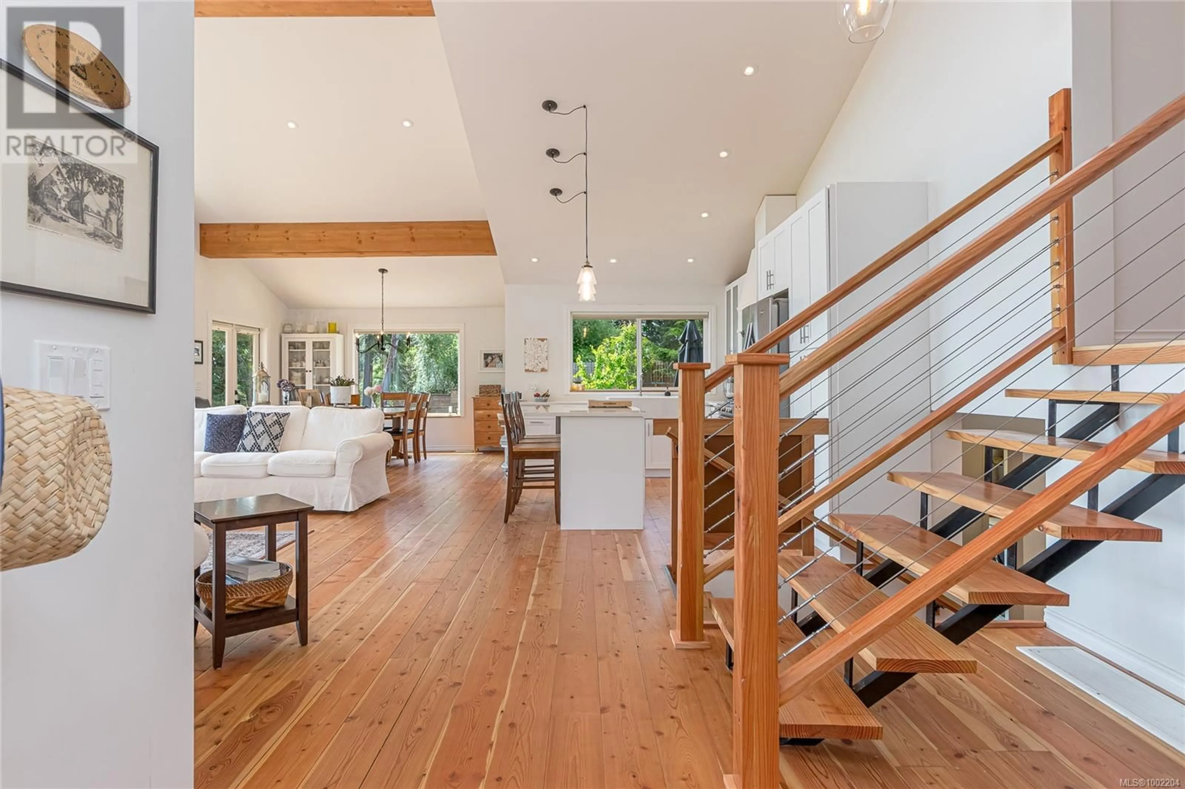 Open concept kitchen, wood/laminate floor for 2965 BARNES ROAD, Nanaimo British Columbia V9X1N9