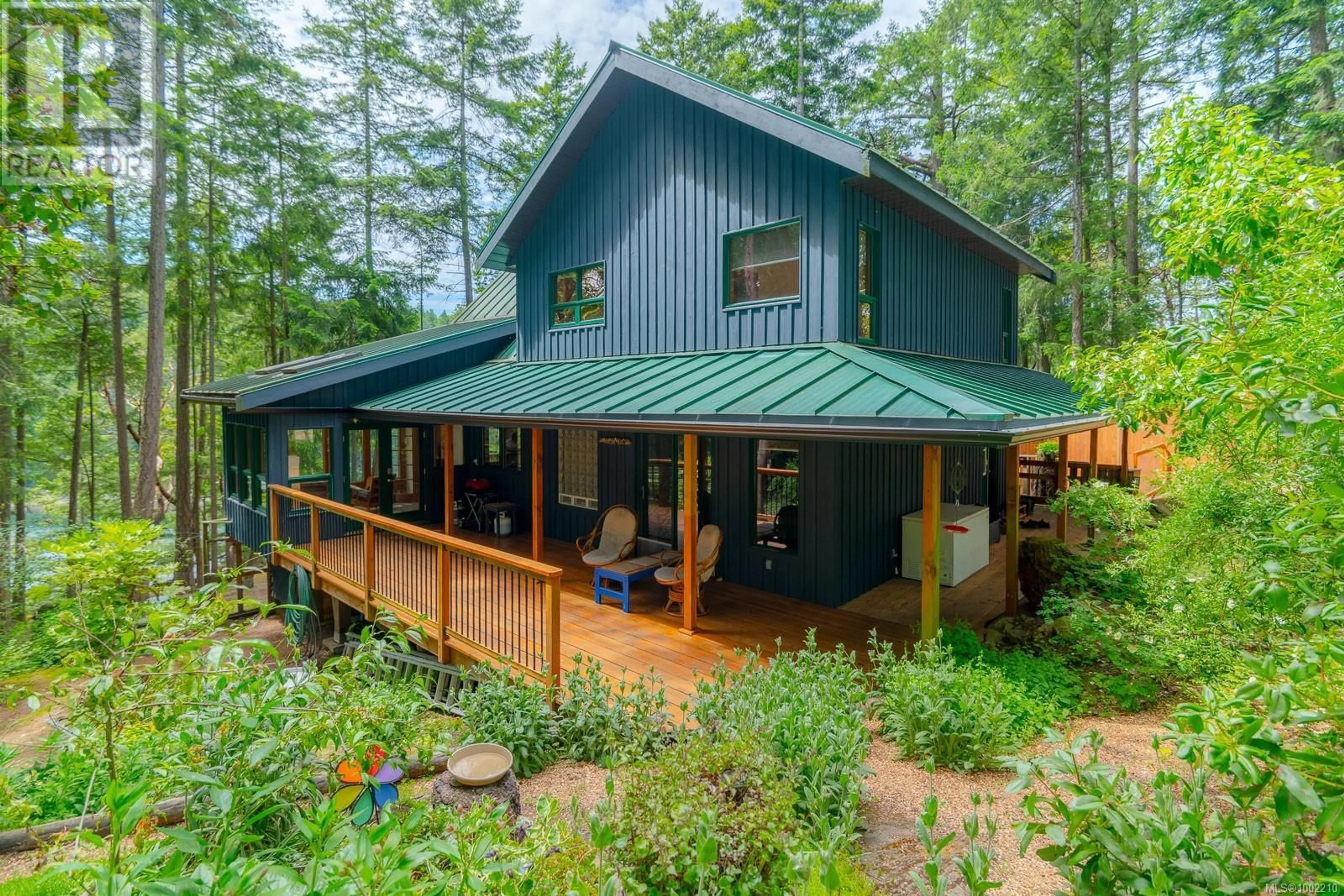 Home with vinyl exterior material, unknown for 211 HALIBUT HILL ROAD, Mudge Island British Columbia V0R1X0