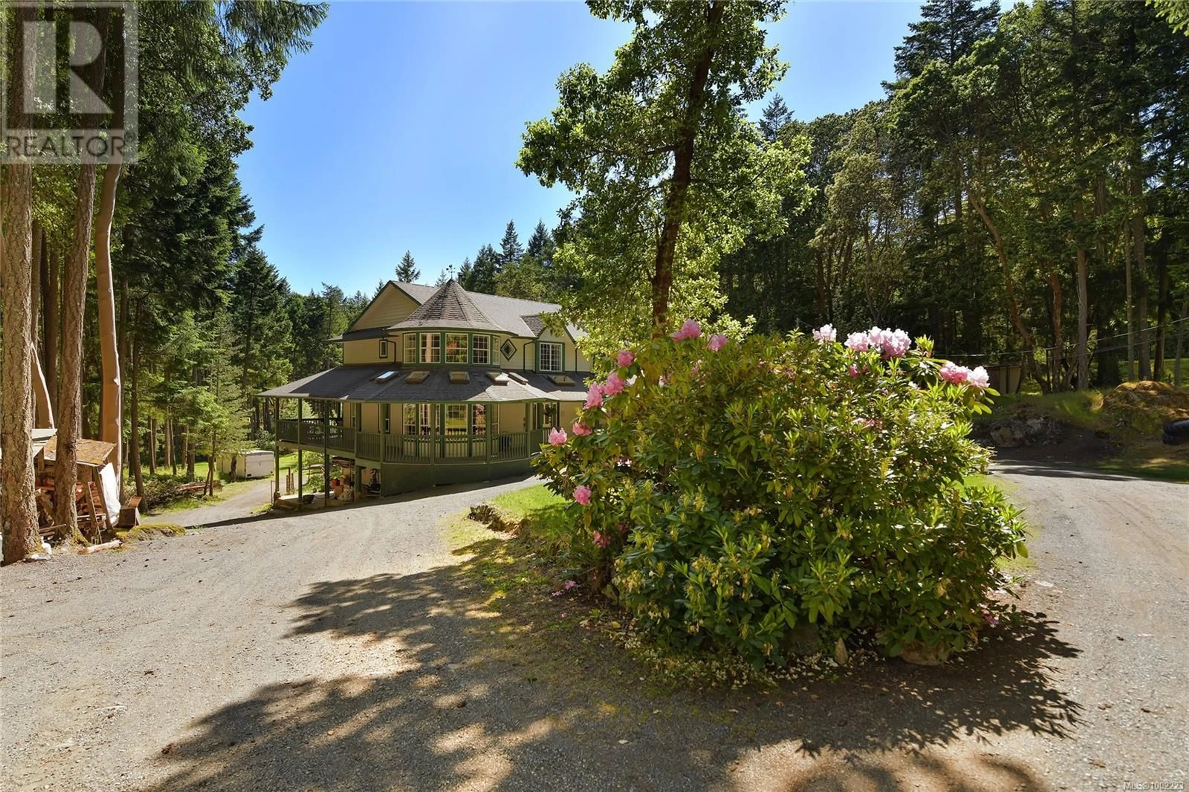 A pic from outside/outdoor area/front of a property/back of a property/a pic from drone, forest/trees view for 1163 ASPEN ROAD, Malahat British Columbia V0R2L0