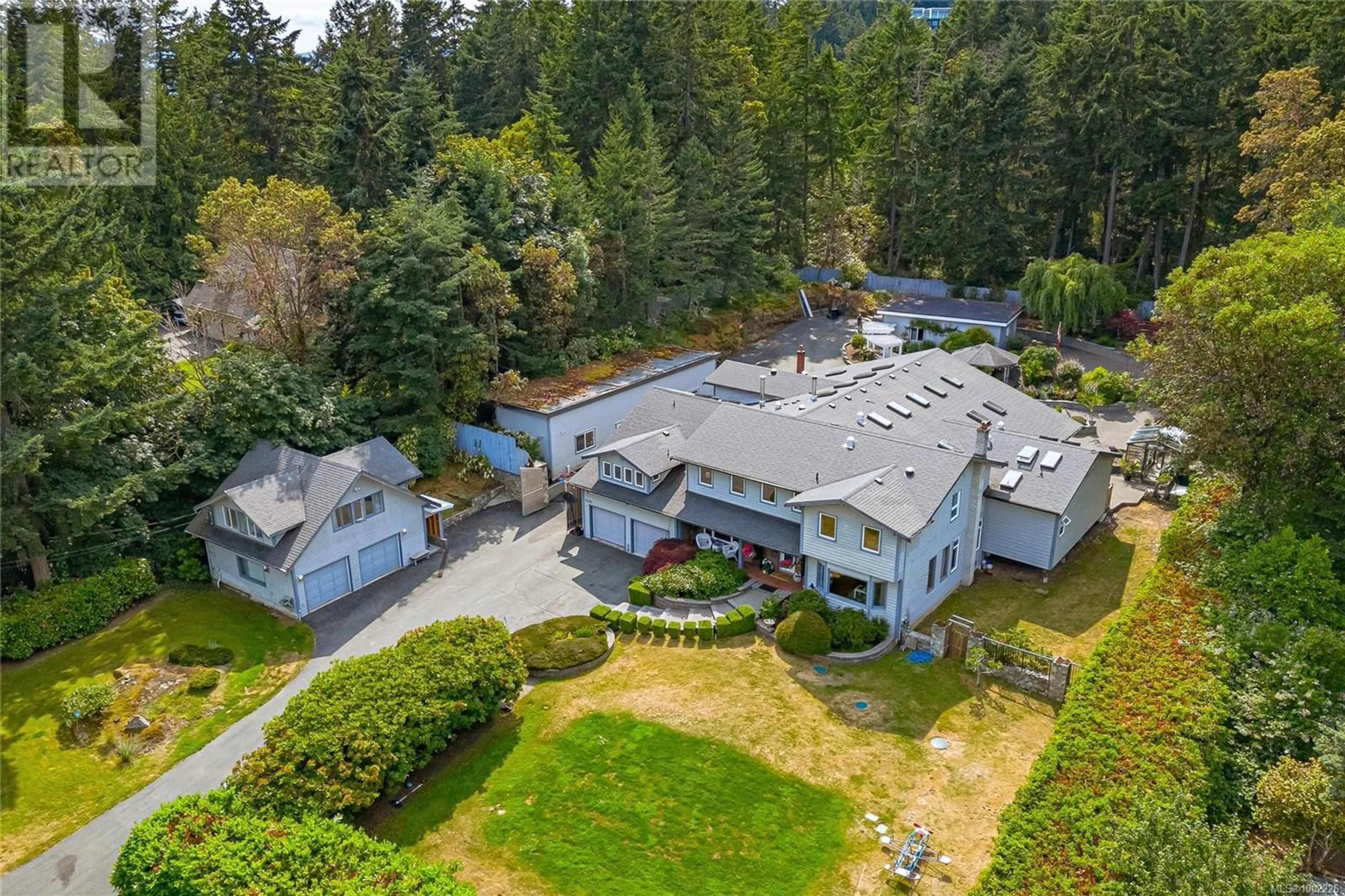 A pic from outside/outdoor area/front of a property/back of a property/a pic from drone, mountain view for 11376 OSPREY PLACE, North Saanich British Columbia V8L5K6